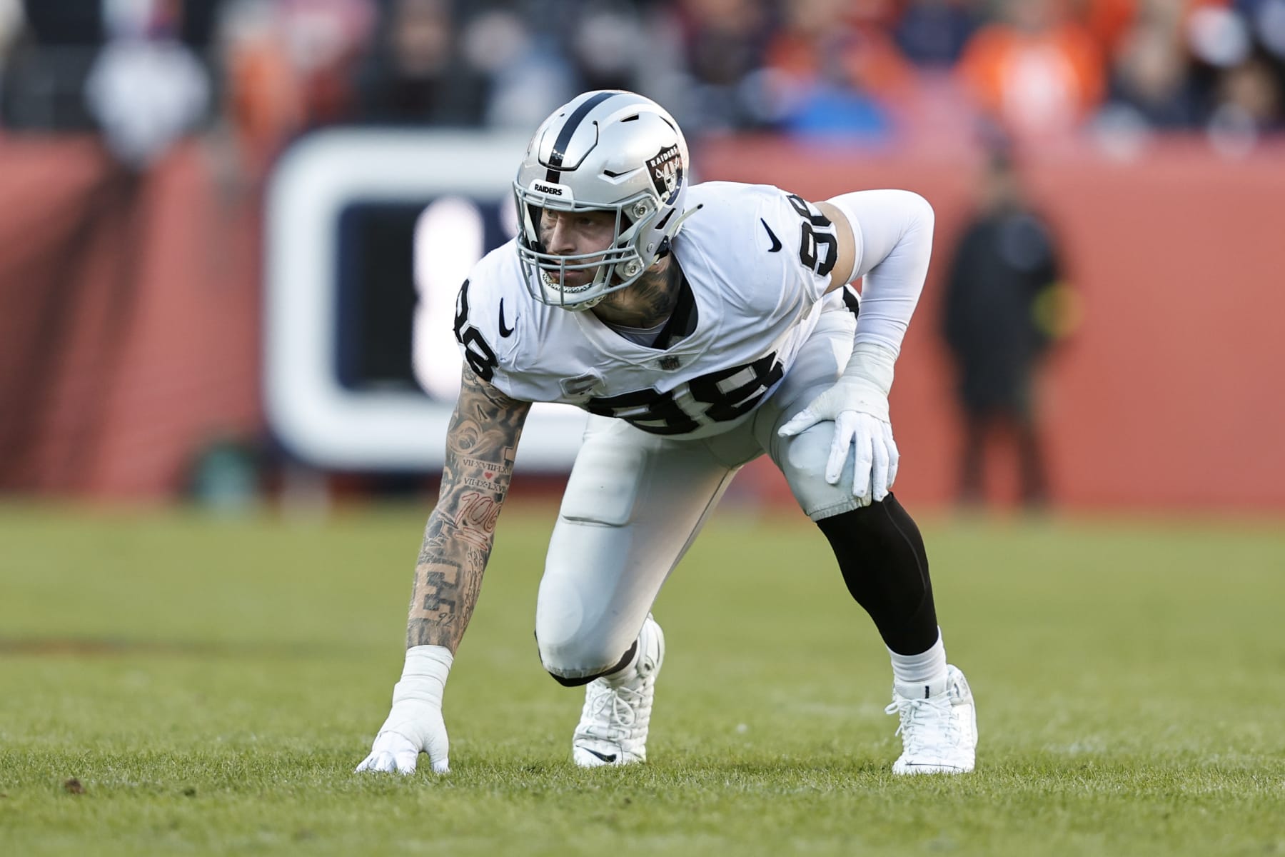 DENVER, COLORADO - NOVEMBER 20: Maxx Crosby #98 of the Las Vegas Raiders lines up during an NFL game between the Las Vegas Raiders and Denver Broncos at Empower Field At Mile High on November 20, 2022 in Denver, Colorado. The Las Vegas Raiders won in overtime (Photo by Michael Owens/Getty Images)