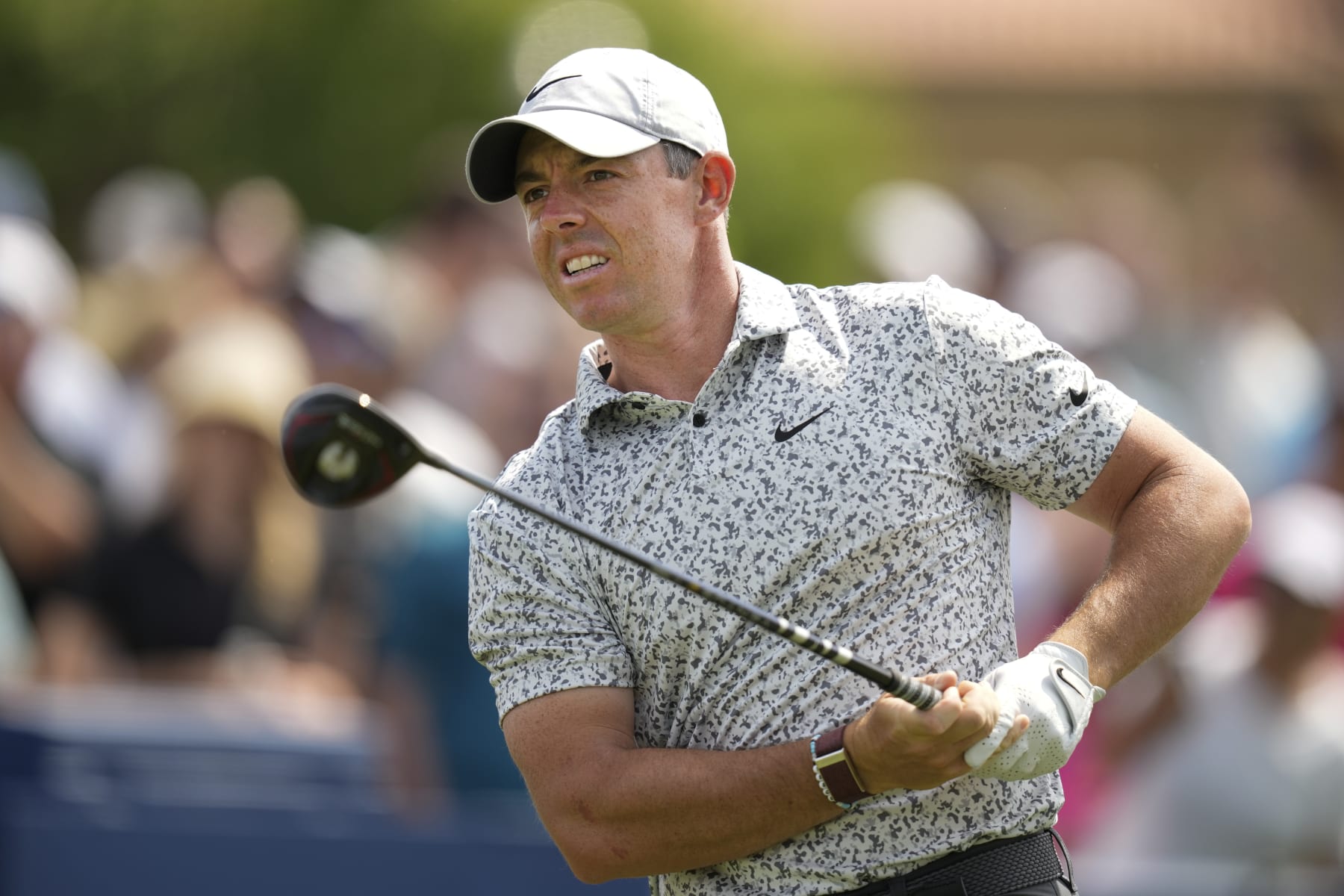 Rory McIlroy, of Northern Ireland, watches his drive from the first tee during the second round of the Players Championship golf tournament Friday, March 10, 2023, in Ponte Vedra Beach, Fla. (AP Photo/Charlie Neibergall)