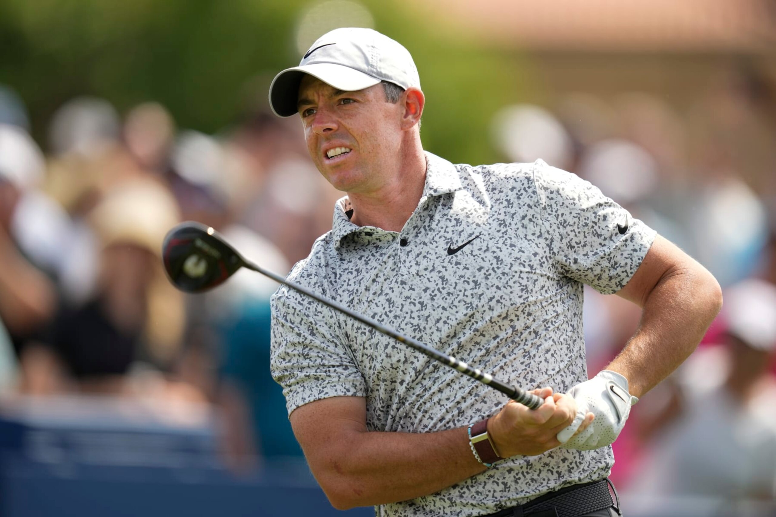 Rory McIlroy, of Northern Ireland, watches his drive from the first tee during the second round of the Players Championship golf tournament Friday, March 10, 2023, in Ponte Vedra Beach, Fla. (AP Photo/Charlie Neibergall)