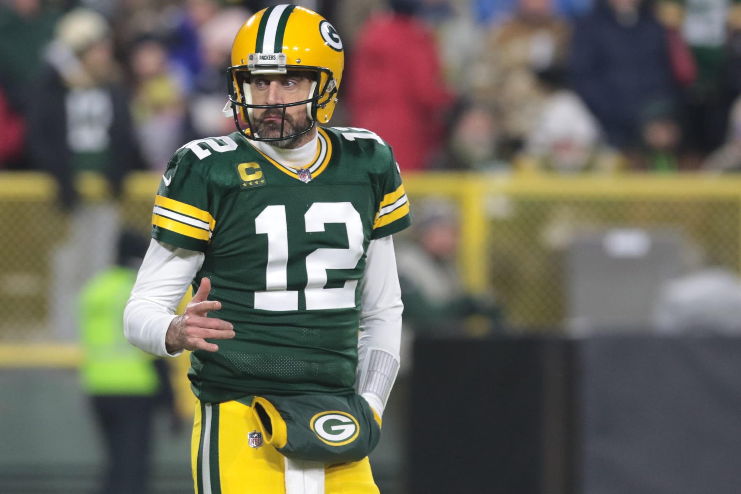 GREEN BAY, WI - JANUARY 08: Green Bay Packers quarterback Aaron Rodgers (12) acknowledges fans during a game between the Green Bay Packers and the Detroit Lions at Lambeau Field on January 8, 2023 in Green Bay, WI. (Photo by Larry Radloff/Icon Sportswire via Getty Images)