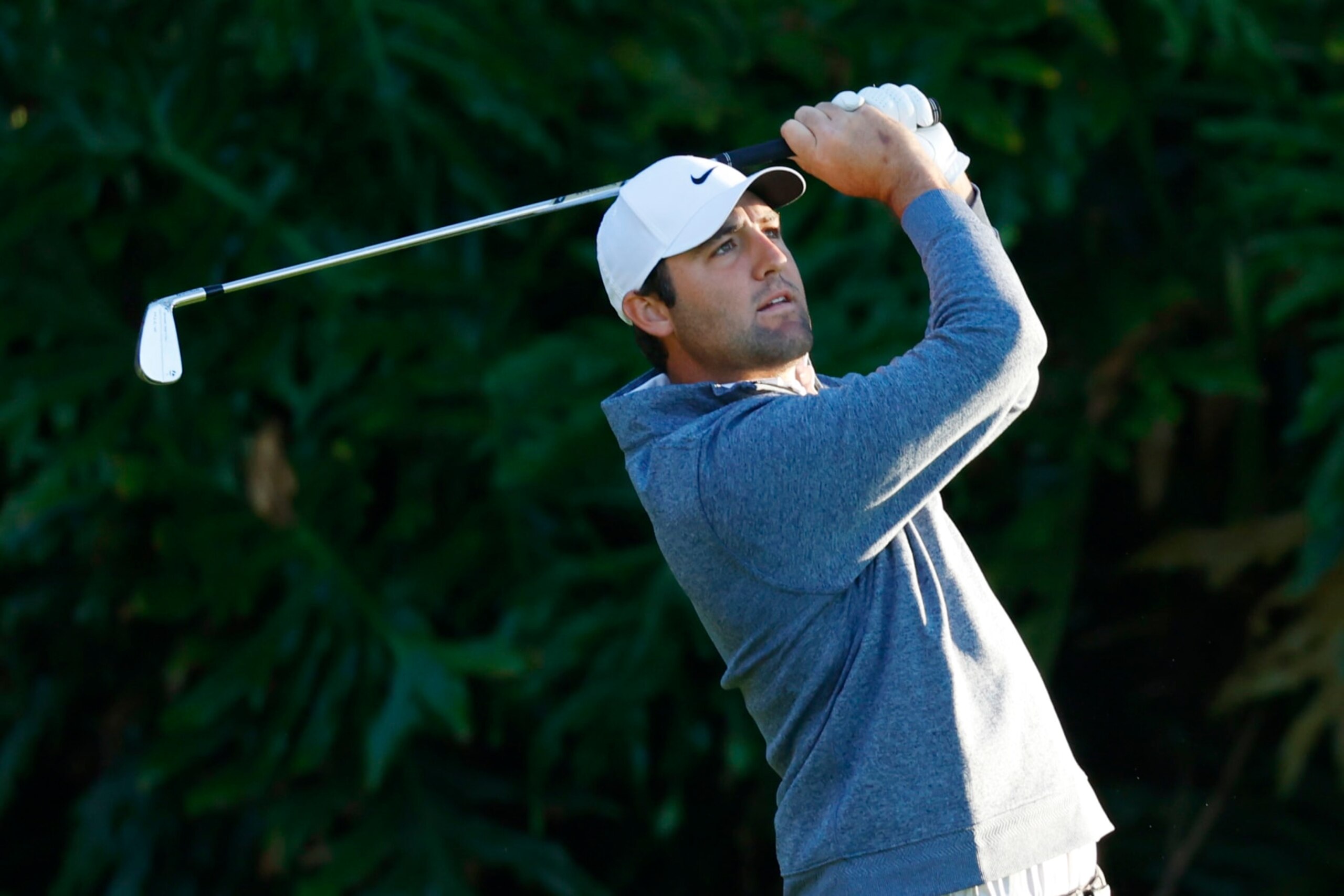 PONTE VEDRA BEACH, FL - MARCH 11: PGA golfer Scottie Scheffler hits his tee shot on the 13th hole on March 11, 2023, during the second round for THE PLAYERS Championship at TPC Sawgrass in Ponte Vedra Beach, Florida. (Photo by Brian Spurlock/Icon Sportswire via Getty Images)