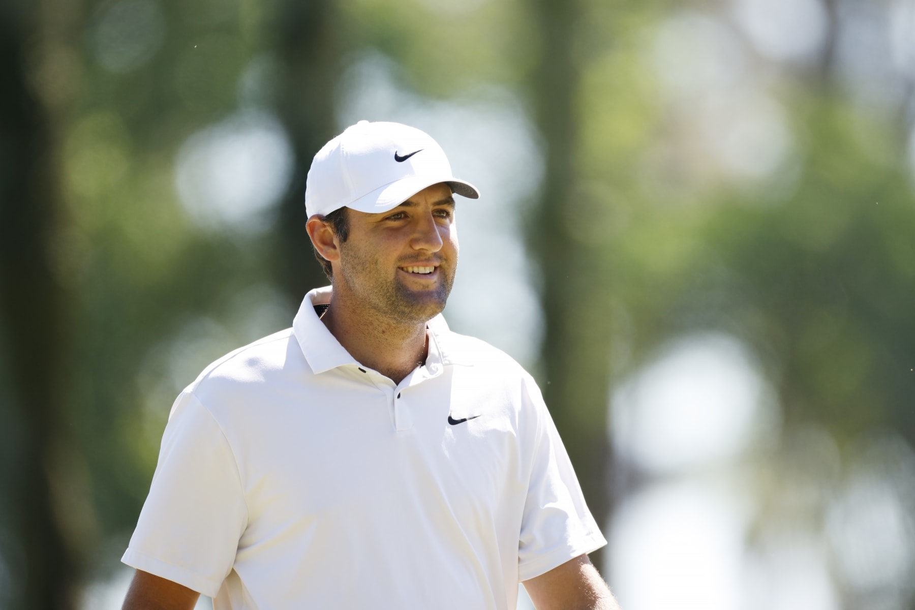 PONTE VEDRA BEACH, FLORIDA - MARCH 11: Scottie Scheffler of the United States smiles on the first green during the third round of THE PLAYERS Championship on THE PLAYERS Stadium Course at TPC Sawgrass on March 11, 2023 in Ponte Vedra Beach, Florida. (Photo by Jared C. Tilton/Getty Images)