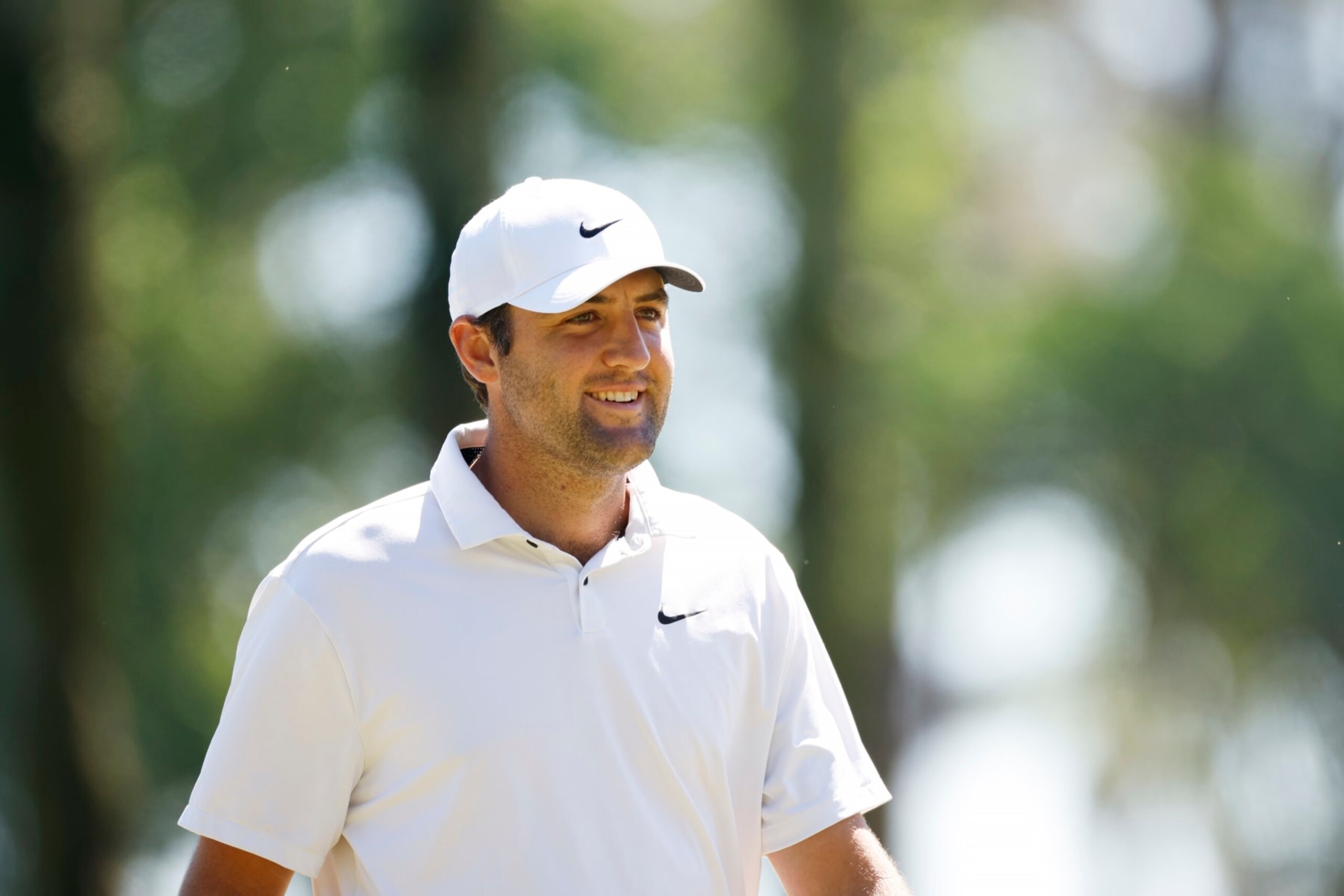 PONTE VEDRA BEACH, FLORIDA - MARCH 11: Scottie Scheffler of the United States smiles on the first green during the third round of THE PLAYERS Championship on THE PLAYERS Stadium Course at TPC Sawgrass on March 11, 2023 in Ponte Vedra Beach, Florida. (Photo by Jared C. Tilton/Getty Images)