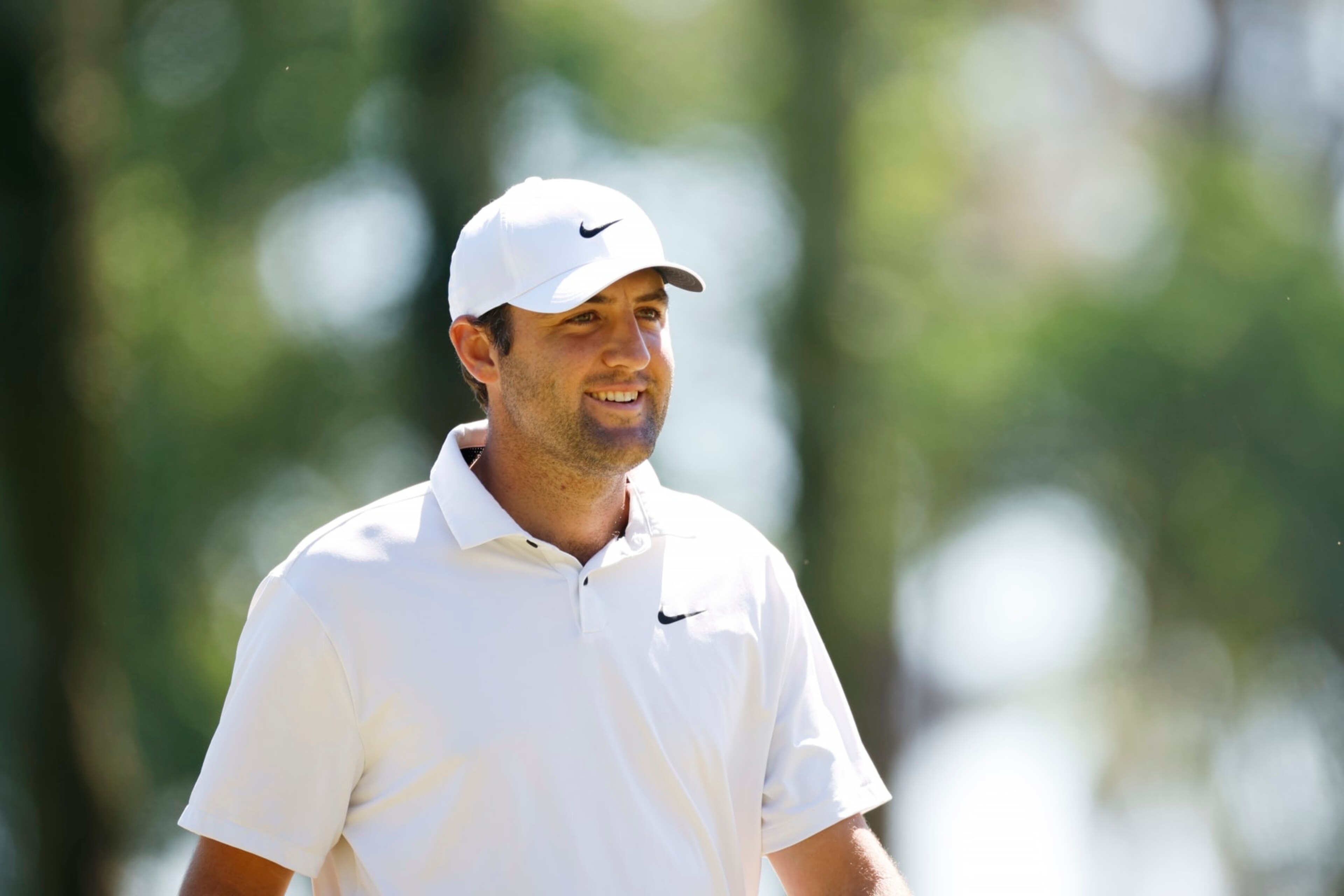 PONTE VEDRA BEACH, FLORIDA - MARCH 11: Scottie Scheffler of the United States smiles on the first green during the third round of THE PLAYERS Championship on THE PLAYERS Stadium Course at TPC Sawgrass on March 11, 2023 in Ponte Vedra Beach, Florida. (Photo by Jared C. Tilton/Getty Images) PONTE VEDRA BEACH, FLORIDA - MARCH 11: Scottie Scheffler of the United States smiles on the first green during the third round of THE PLAYERS Championship on THE PLAYERS Stadium Course at TPC Sawgrass on March 11, 2023 in Ponte Vedra Beach, Florida. (Photo by Jared C. Tilton/Getty Images)