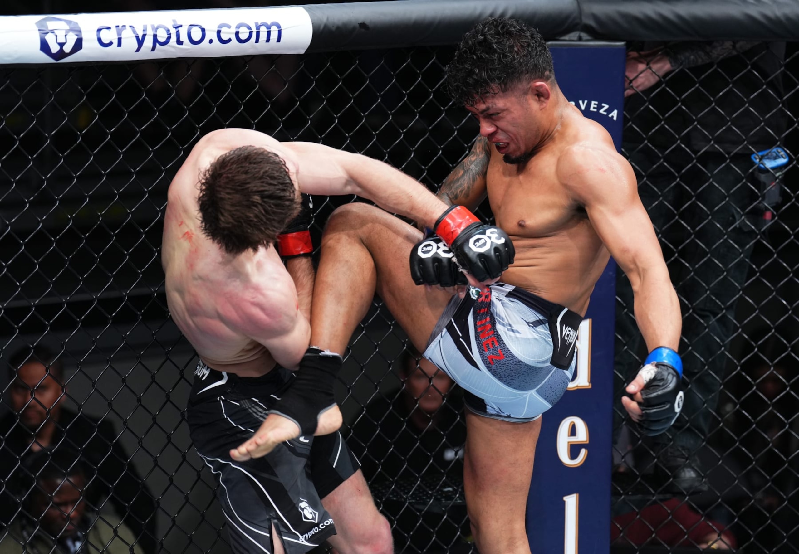 LAS VEGAS, NEVADA - MARCH 11: (R-L) Jonathan Martinez knees Said Nurmagomedov of Russia in a bantamweight fight during the UFC Fight Night event at The Theater at Virgin Hotels Las Vegas on March 11, 2023 in Las Vegas, Nevada. (Photo by Chris Unger/Zuffa LLC via Getty Images)