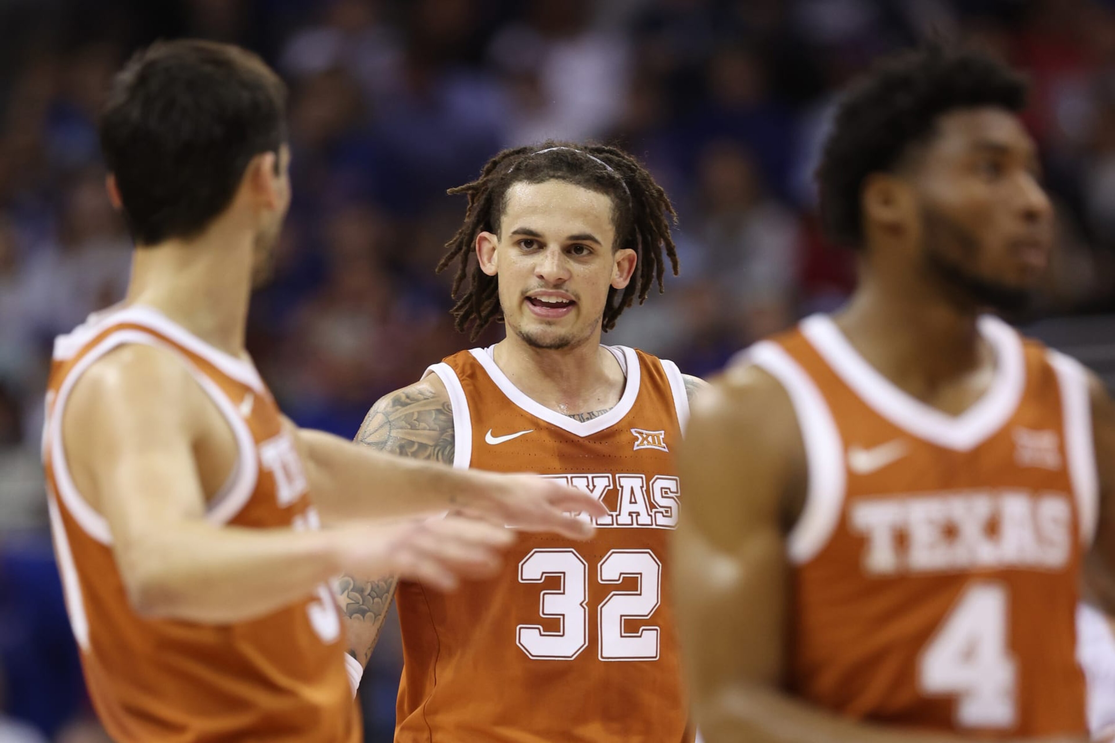 KANSAS CITY, MISSOURI - MARCH 11: Christian Bishop #32 of the Texas Longhorns celebrates a basket against the Kansas Jayhawks during the first half in the Big 12 Tournament Championship game at T-Mobile Center on March 11, 2023 in Kansas City, Missouri. (Photo by Jamie Squire/Getty Images) KANSAS CITY, MISSOURI - MARCH 11: Christian Bishop #32 of the Texas Longhorns celebrates a basket against the Kansas Jayhawks during the first half in the Big 12 Tournament Championship game at T-Mobile Center on March 11, 2023 in Kansas City, Missouri. (Photo by Jamie Squire/Getty Images)