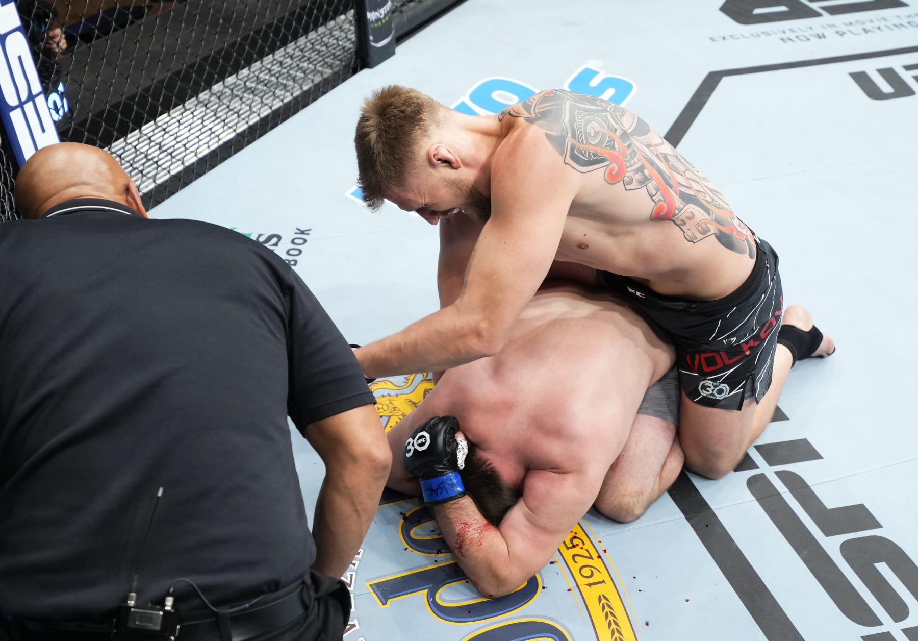 LAS VEGAS, NEVADA - MARCH 11: (R-L) Alexander Volkov of Russia punches Alexandr Romanov of Moldova in a heavyweight fight during the UFC Fight Night event at The Theater at Virgin Hotels Las Vegas on March 11, 2023 in Las Vegas, Nevada. (Photo by Chris Unger/Zuffa LLC via Getty Images)