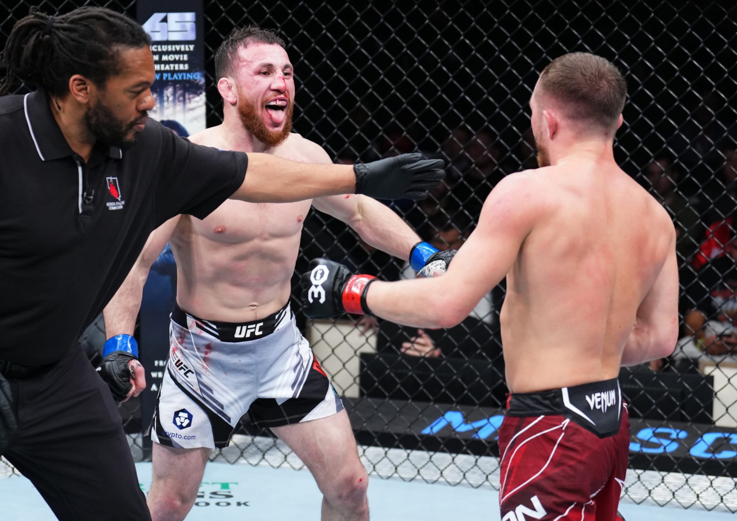 LAS VEGAS, NEVADA - MARCH 11: Merab Dvalishvili (L) of Georgia reacts after the conclusion of his bantamweight fight against Petr Yan of Russia during the UFC Fight Night event at The Theater at Virgin Hotels Las Vegas on March 11, 2023 in Las Vegas, Nevada. (Photo by Chris Unger/Zuffa LLC via Getty Images)