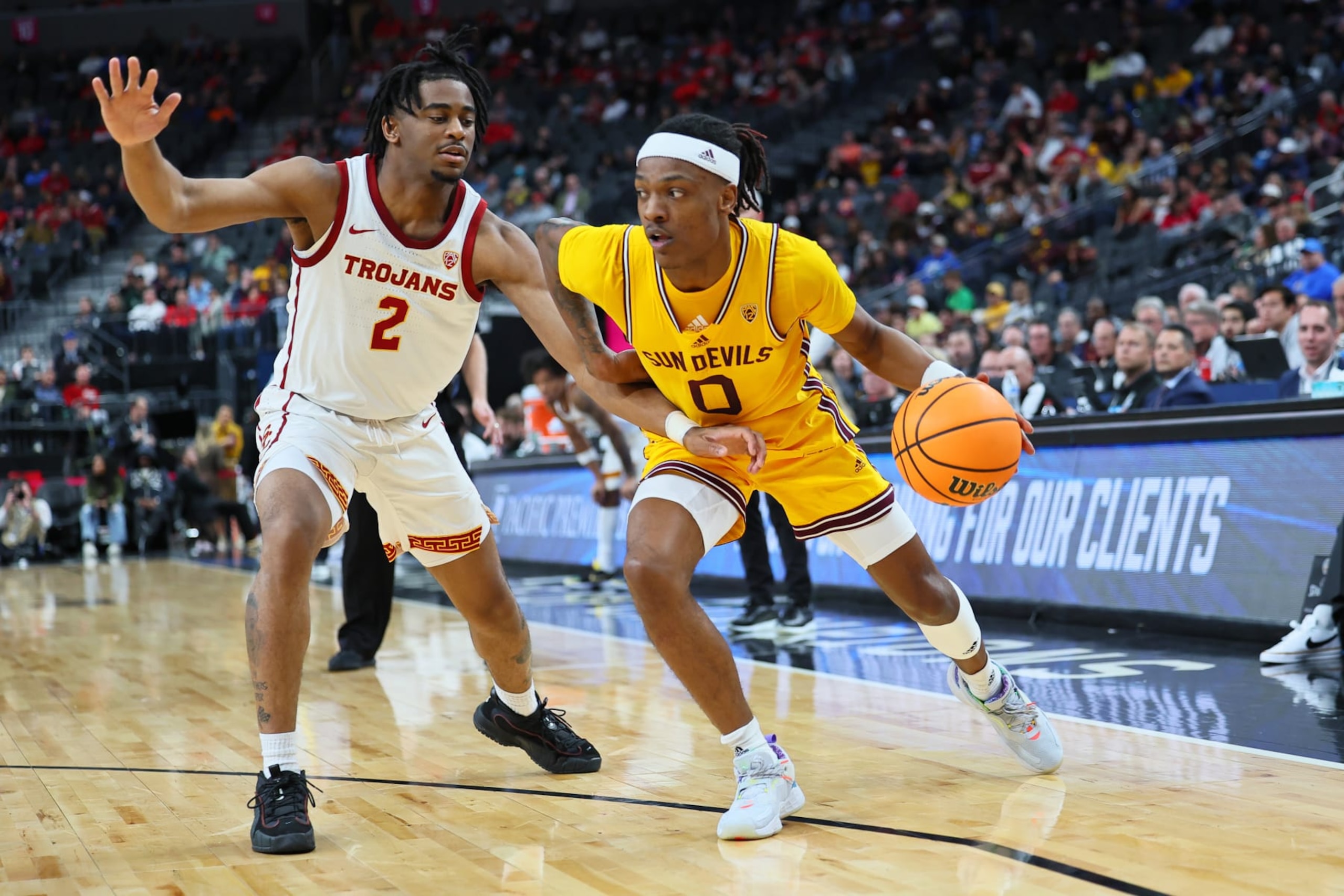 LAS VEGAS, NEVADA - MARCH 09: DJ Horne #0 of the Arizona State Sun Devils handles the ball against Reese Dixon-Waters #2 of the USC Trojans in the first half of a quarterfinal game of the Pac-12 basketball tournament at T-Mobile Arena on March 09, 2023 in Las Vegas, Nevada. (Photo by Leon Bennett/Getty Images)