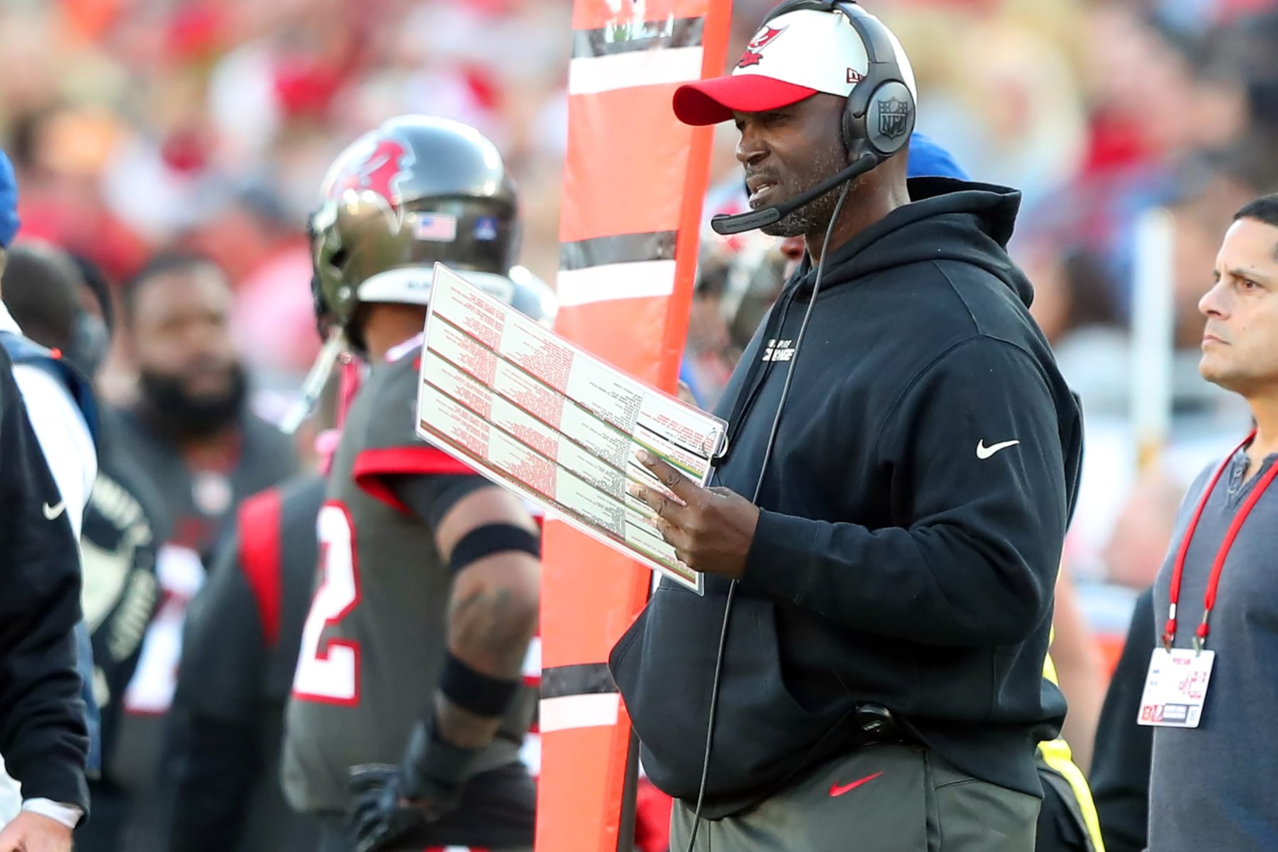 TAMPA, FL - DECEMBER 18: Tampa Bay Buccaneers Head Coach Todd Bowles watches the action on the field during the regular season game between the Cincinnati Bengals and the Tampa Bay Buccaneers on December 18, 2022 at Raymond James Stadium in Tampa, Florida. (Photo by Cliff Welch/Icon Sportswire via Getty Images)
