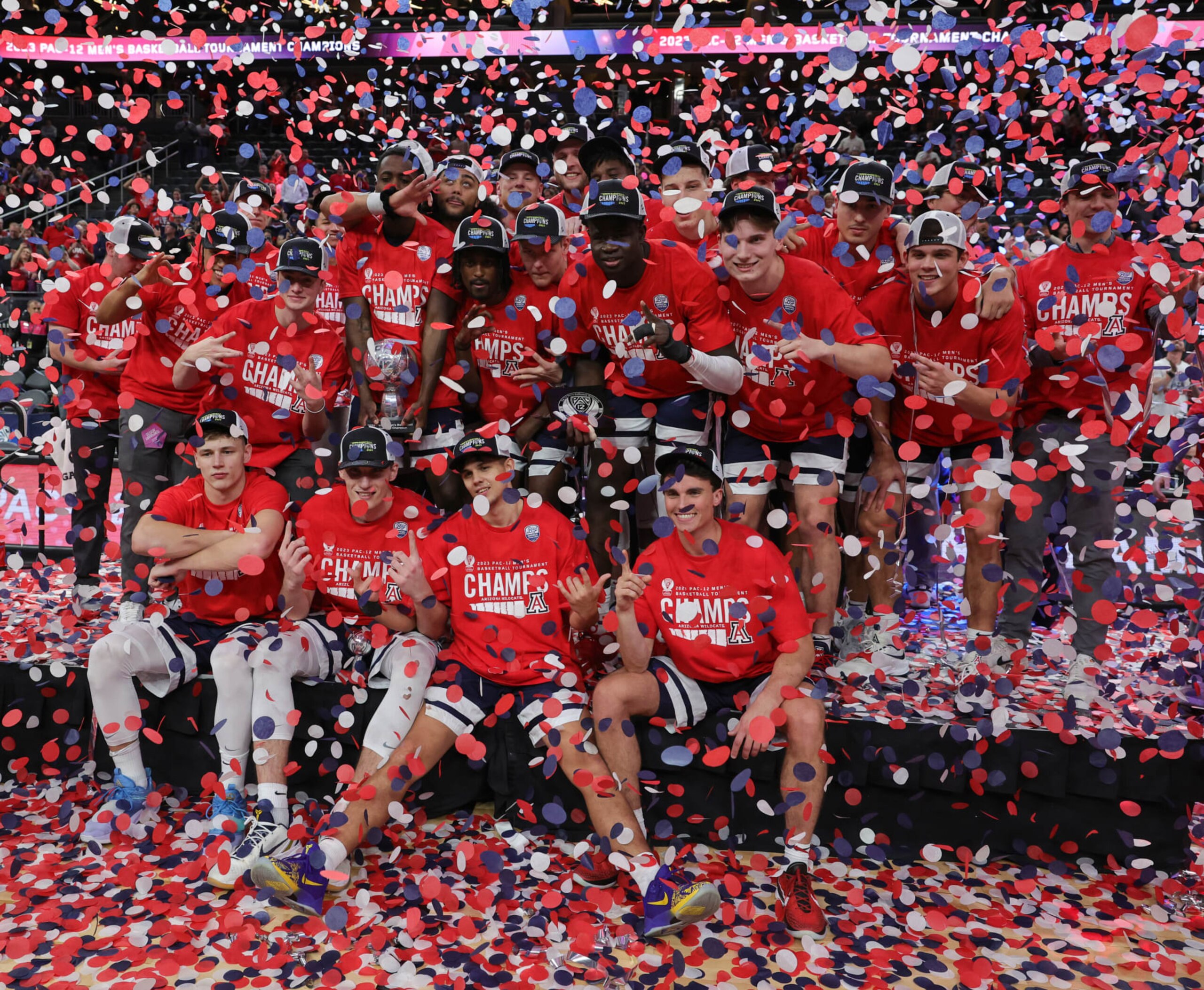 LAS VEGAS, NEVADA - MARCH 11: The Arizona Wildcats celebrate their 61-59 victory over the UCLA Bruins to win the championship game of the Pac-12 basketball tournament at T-Mobile Arena on March 11, 2023 in Las Vegas, Nevada. (Photo by Ethan Miller/Getty Images)