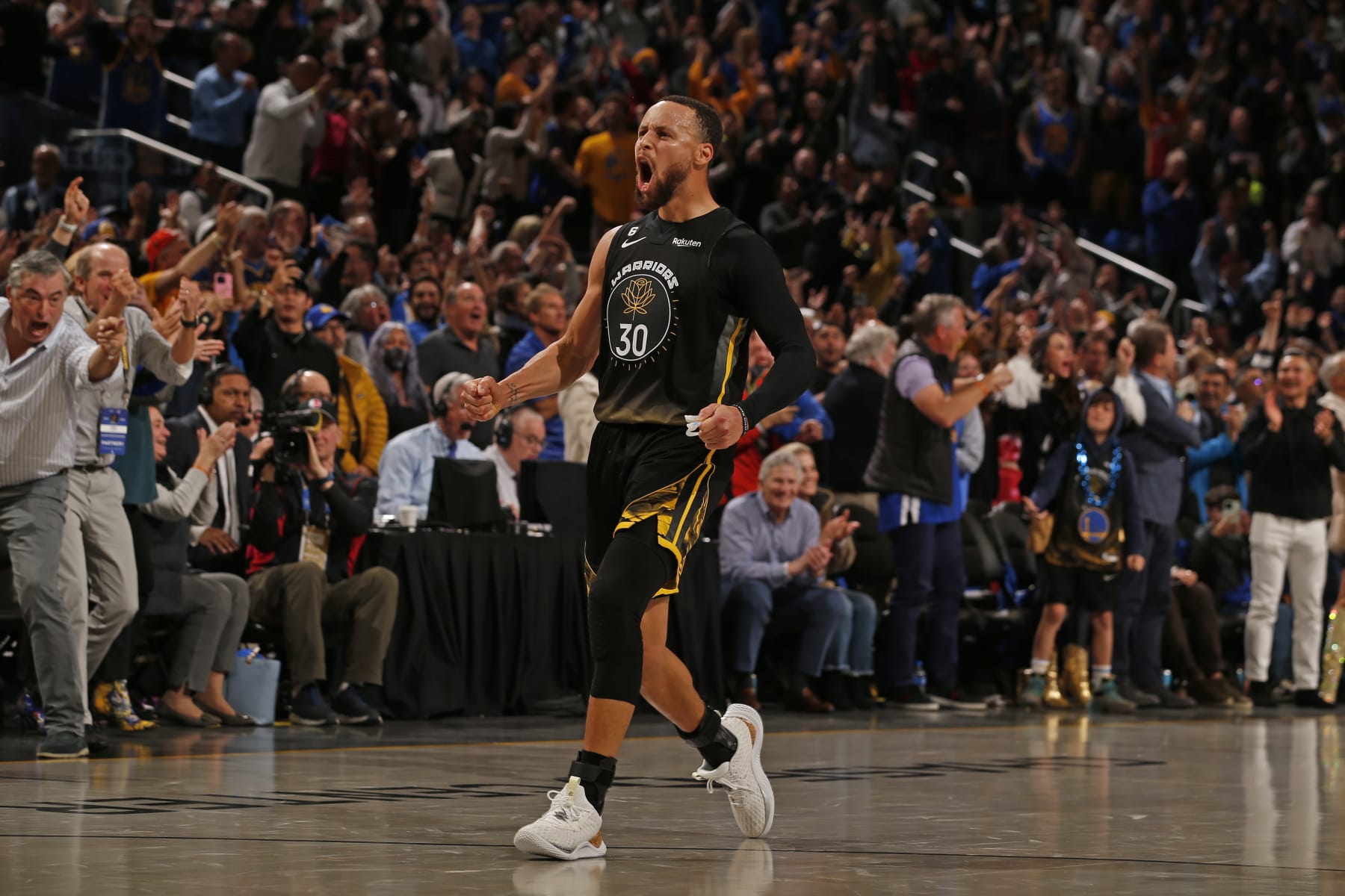 SAN FRANCISCO, CA - MARCH 11: Stephen Curry #30 of the Golden State Warriors celebrates the game-tying shot against the Milwaukee Bucks on March 11, 2023 at Chase Center in San Francisco, California. NOTE TO USER: User expressly acknowledges and agrees that, by downloading and or using this photograph, user is consenting to the terms and conditions of Getty Images License Agreement. Mandatory Copyright Notice: Copyright 2023 NBAE (Photo by Jed Jacobsohn/NBAE via Getty Images)