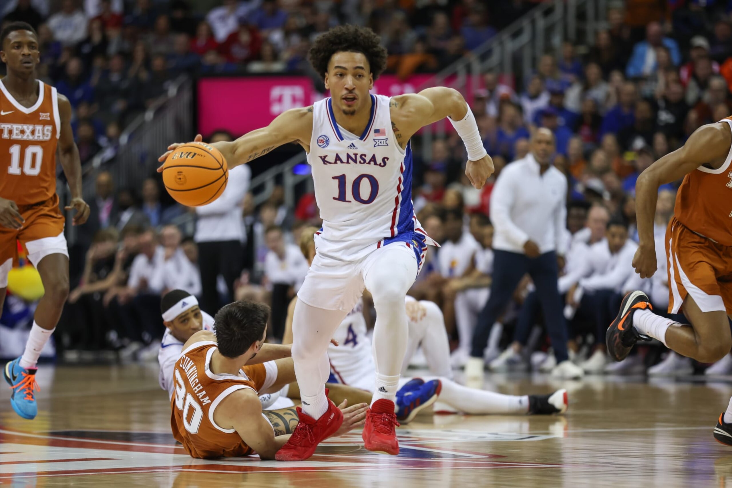 KANSAS CITY, MO - MARCH 11: Kansas Jayhawks forward Jalen Wilson (10) leads the fast break in the first half of the Big 12 basketball tournament championship game between the Texas Longhorns and Kansas Jayhawks on March 11, 2023 at T-Mobile Center in Kansas City, MO. (Photo by Scott Winters/Icon Sportswire via Getty Images)