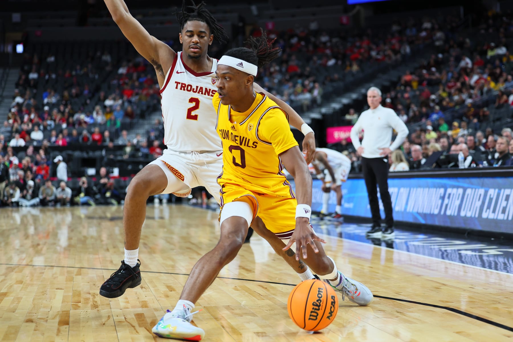 LAS VEGAS, NEVADA - MARCH 09: DJ Horne #0 of the Arizona State Sun Devils handles the ball against Reese Dixon-Waters #2 of the USC Trojans in the first half of a quarterfinal game of the Pac-12 basketball tournament at T-Mobile Arena on March 09, 2023 in Las Vegas, Nevada. (Photo by Leon Bennett/Getty Images)