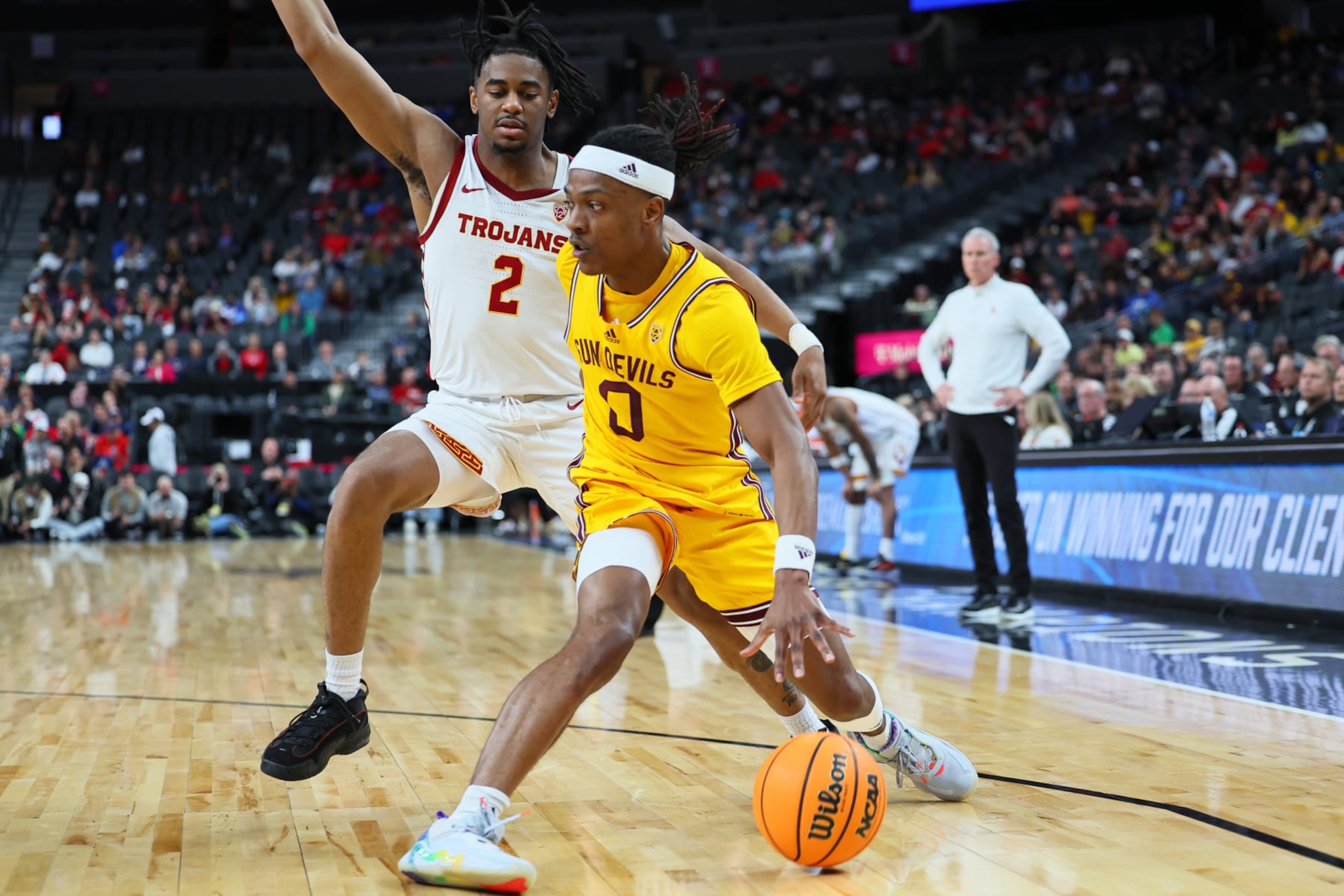 LAS VEGAS, NEVADA - MARCH 09: DJ Horne #0 of the Arizona State Sun Devils handles the ball against Reese Dixon-Waters #2 of the USC Trojans in the first half of a quarterfinal game of the Pac-12 basketball tournament at T-Mobile Arena on March 09, 2023 in Las Vegas, Nevada. (Photo by Leon Bennett/Getty Images)