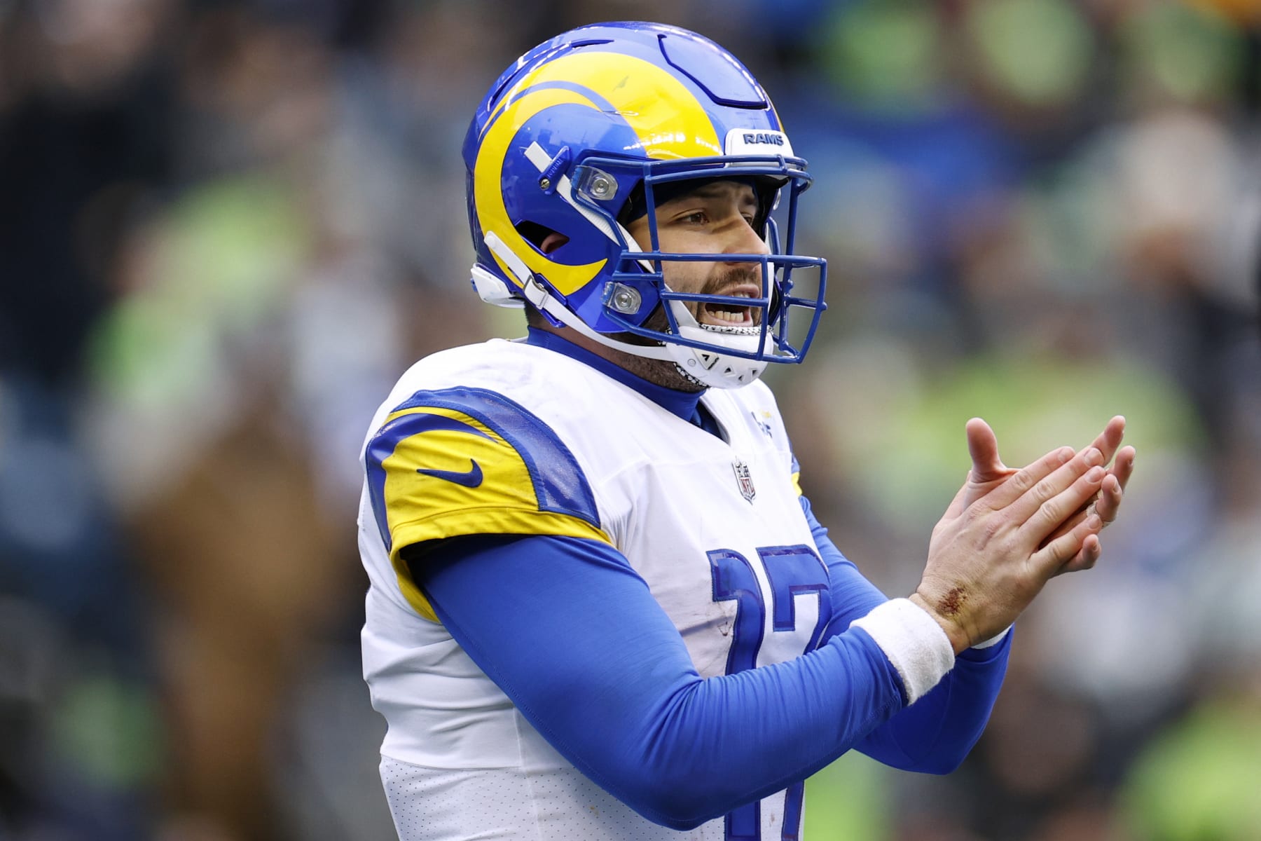 SEATTLE, WASHINGTON - JANUARY 08: Baker Mayfield #17 of the Los Angeles Rams reacts during the first half against the Seattle Seahawks at Lumen Field on January 08, 2023 in Seattle, Washington. (Photo by Steph Chambers/Getty Images)