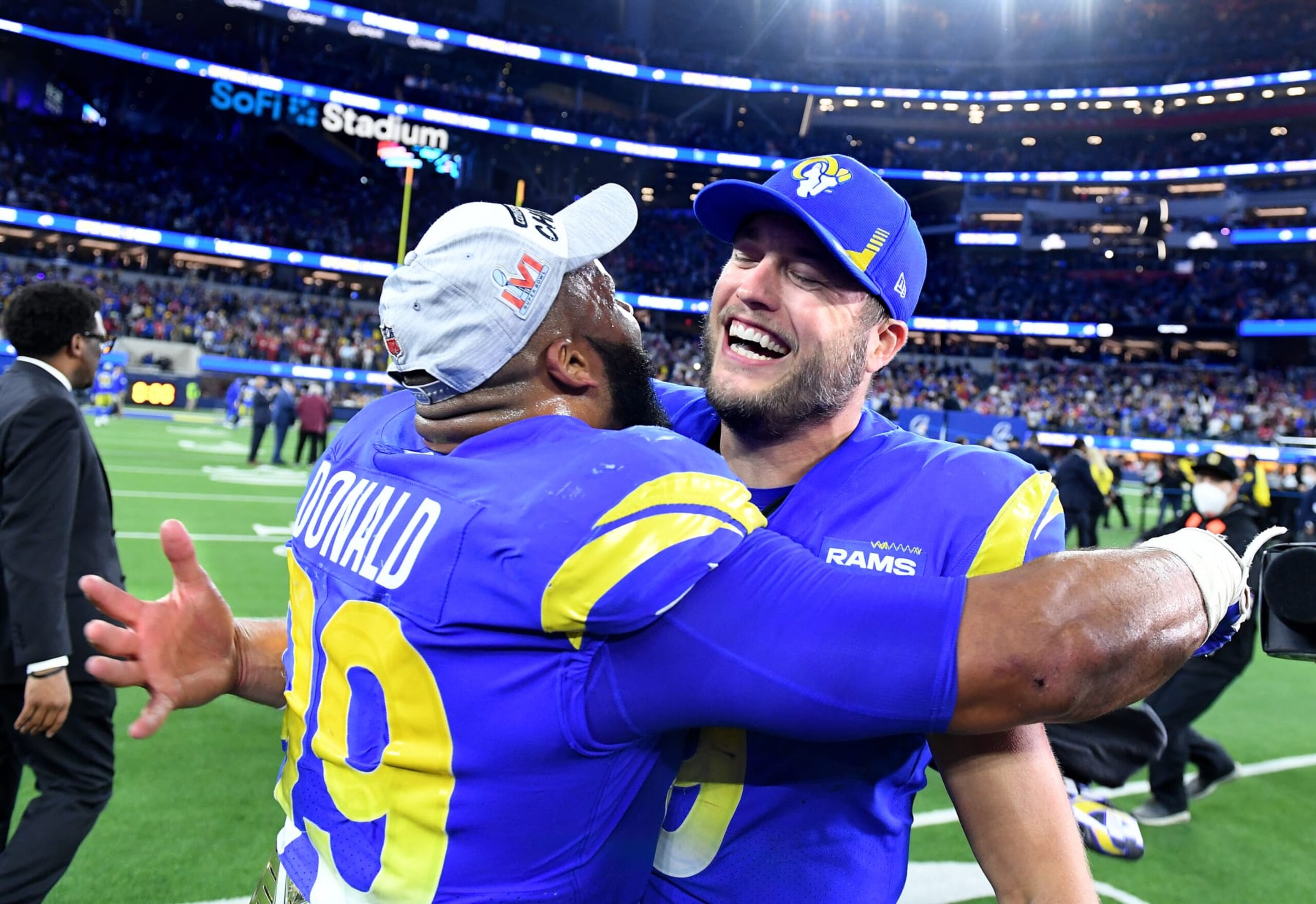 Inglewood, California January 30, 2022: Rams defensive lineman Aaron Donald, left, celebrates with quarterback Matthew Stafford after winning the NFC Championship against the 49ers at SoFi Stadium in Inglewood Sunday. (Wally Skalij/Los Angeles Times via Getty Images)