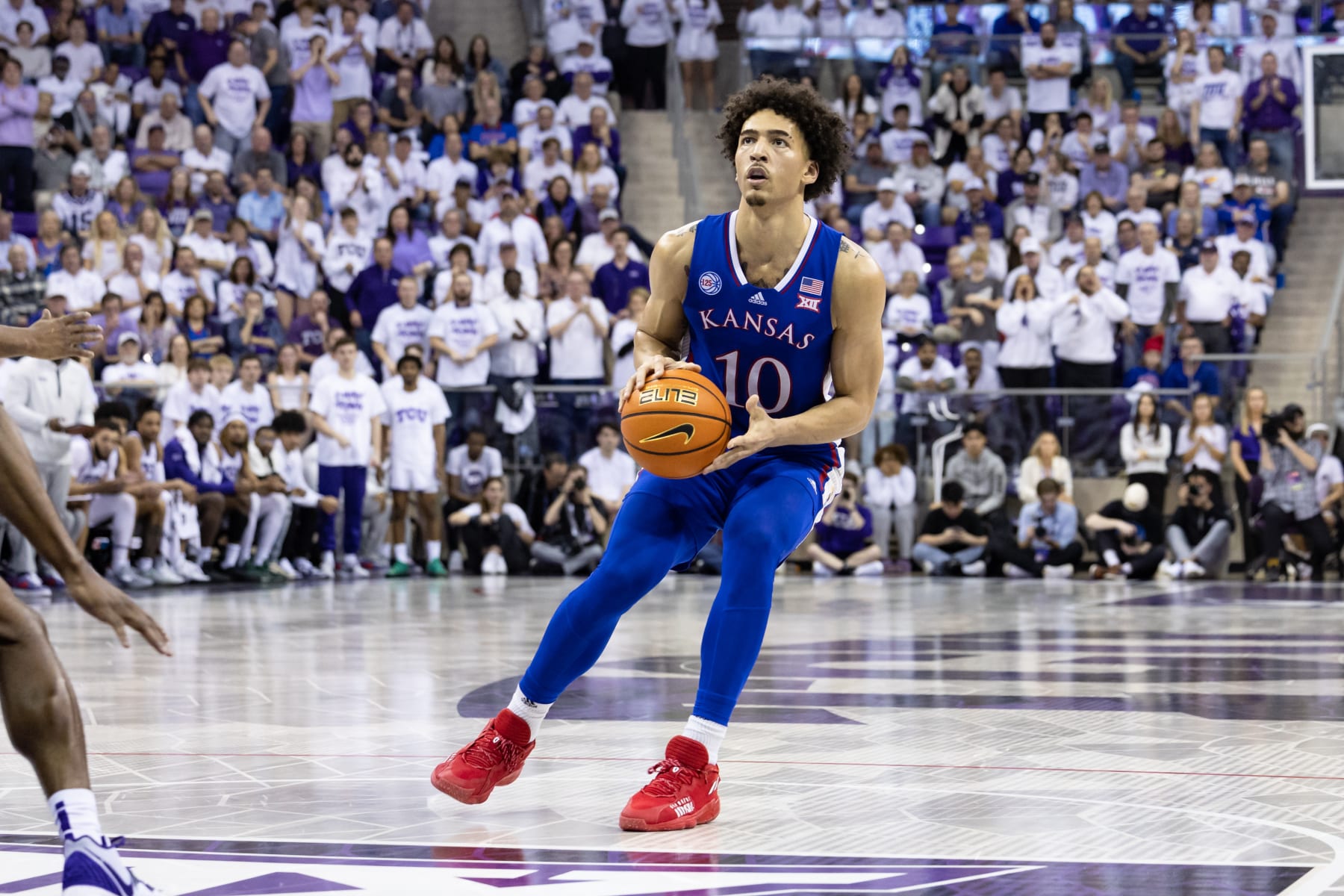 FORT WORTH, TX - FEBRUARY 20: Kansas Jayhawks guard Jalen Wilson (#10) dribbles up court during the college basketball game between the TCU Horned Frogs and Kansas Jayhawks on February 20, 2023 at Ed & Rae Schollmaier Arena in Fort Worth, Texas.  (Photo by Matthew Visinsky/Icon Sportswire via Getty Images)