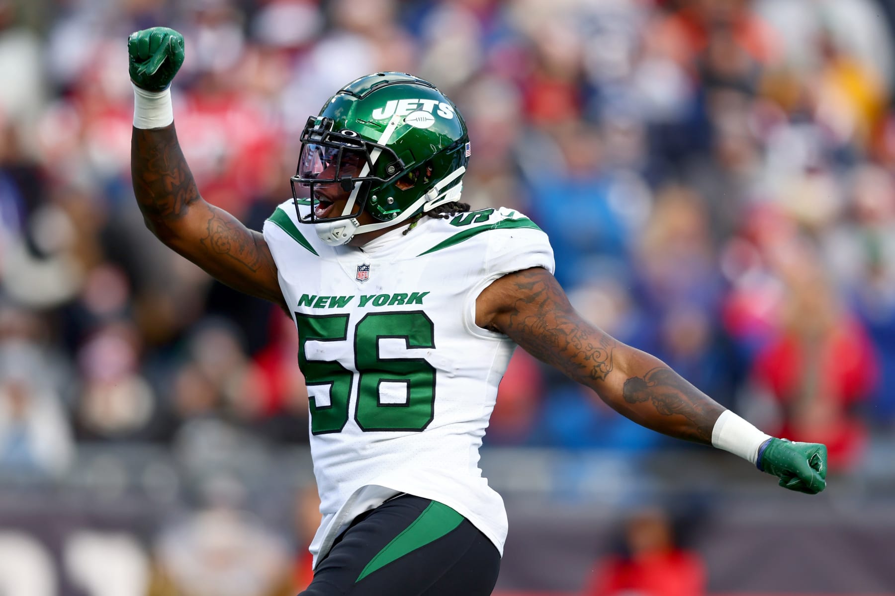 FOXBOROUGH, MASSACHUSETTS - NOVEMBER 20: Quincy Williams #56 of the New York Jets reacts after a sack against the New England Patriots during the first quarter at Gillette Stadium on November 20, 2022 in Foxborough, Massachusetts. (Photo by Adam Glanzman/Getty Images)
