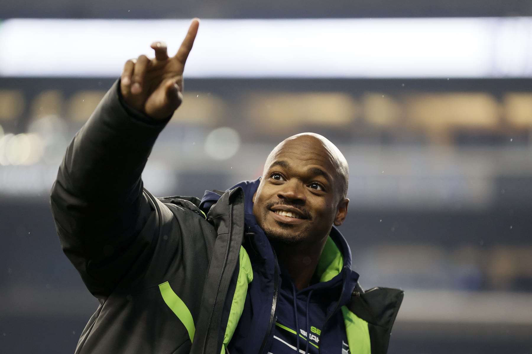 SEATTLE, WASHINGTON - JANUARY 02: Adrian Peterson #21 of the Seattle Seahawks reacts after defeating the Detroit Lions 51-29 at Lumen Field on January 02, 2022 in Seattle, Washington. (Photo by Steph Chambers/Getty Images)