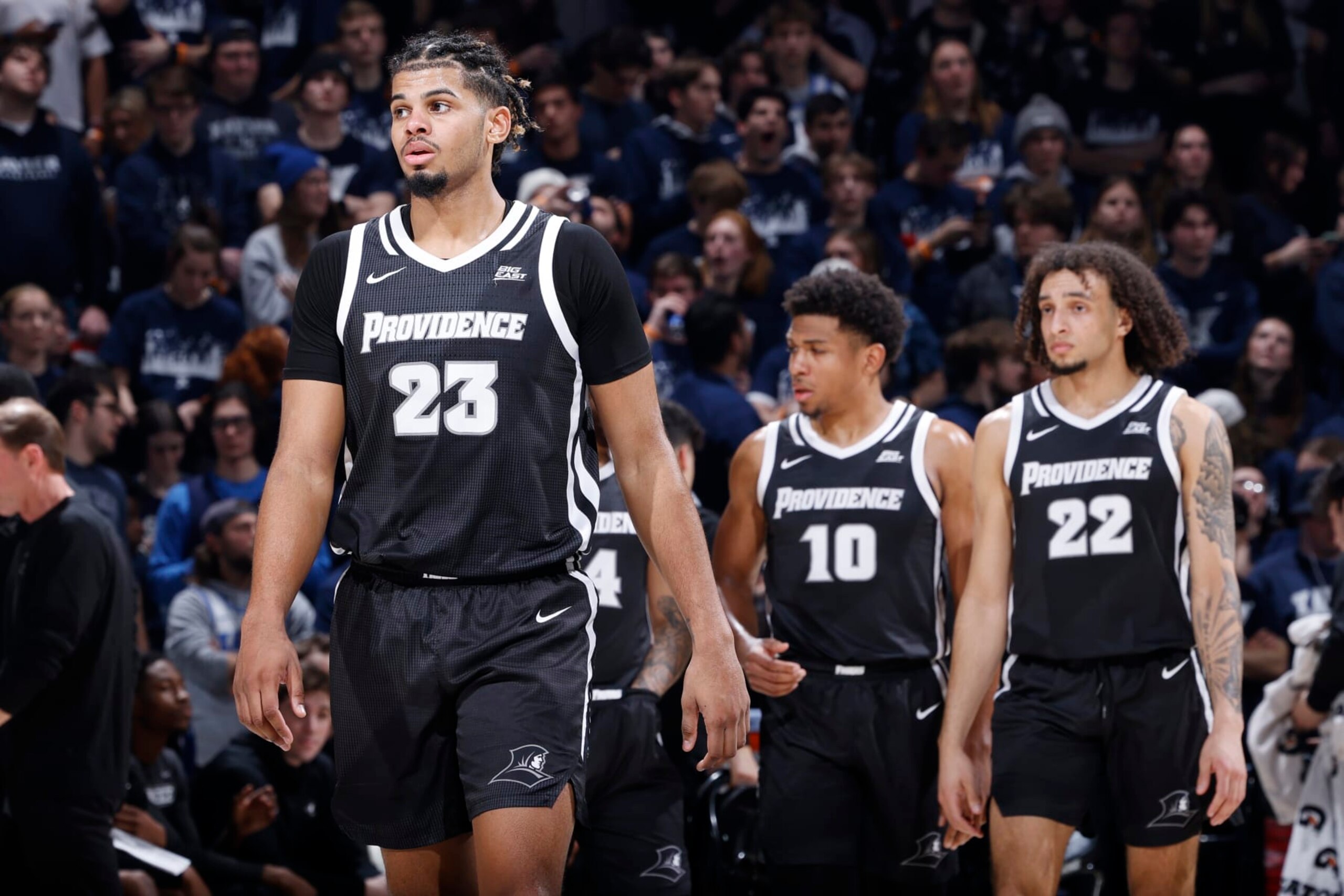 CINCINNATI, OH - FEBRUARY 01: Providence Friars forward Bryce Hopkins (23), guard Noah Locke (10) and guard Devin Carter (22) take the floor during a college basketball game against the Xavier Musketeers on February 1, 2023 at Cintas Center in Cincinnati, Ohio. (Photo by Joe Robbins/Icon Sportswire via Getty Images)