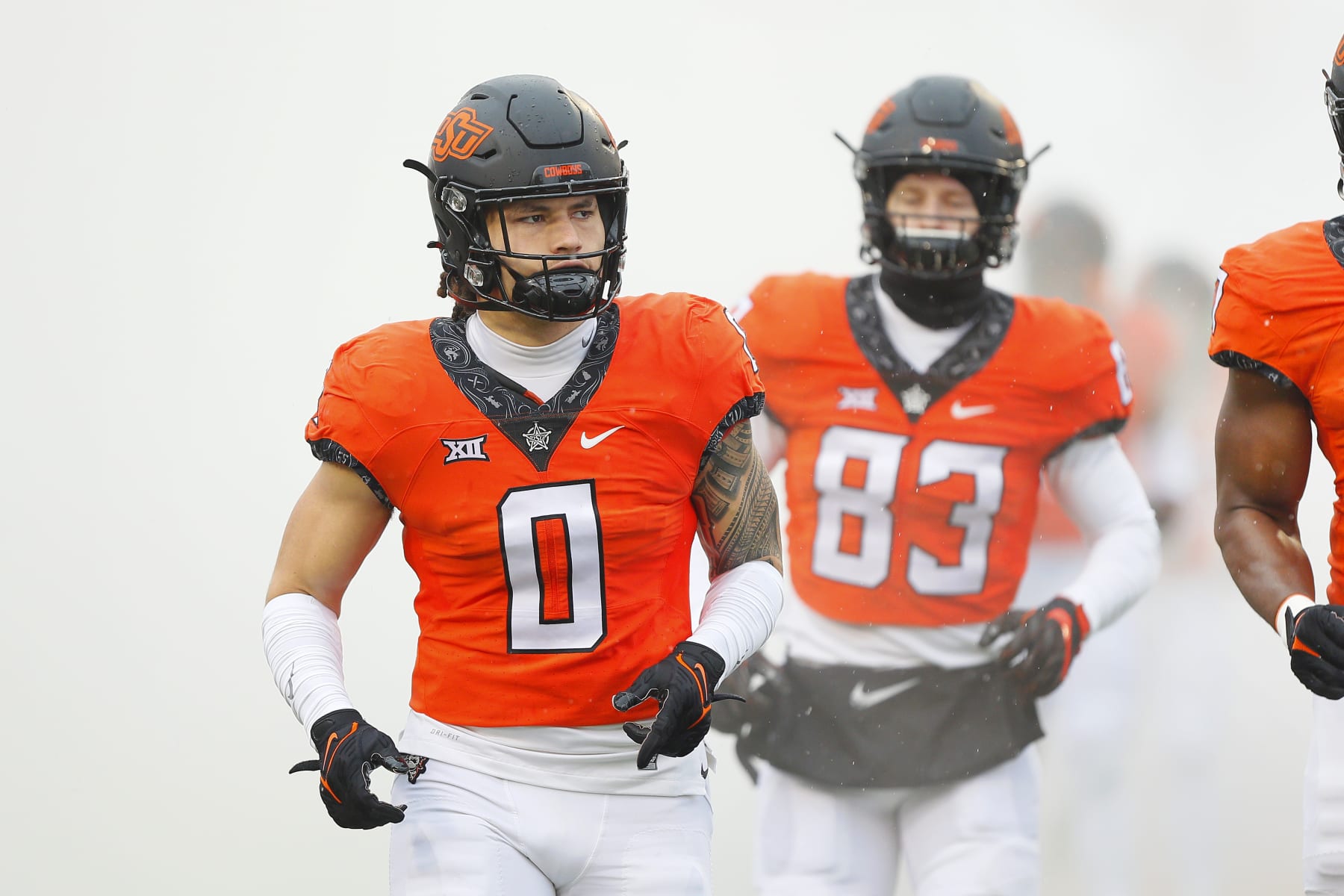 STILLWATER, OK - NOVEMBER 26:  Linebacker Mason Cobb #0 of the Oklahoma State Cowboys runs onto the field for a game against the West Virginia Mountaineers at Boone Pickens Stadium on November 26, 2022 in Stillwater, Oklahoma.  West Virginia won 24-19.  (Photo by Brian Bahr/Getty Images)