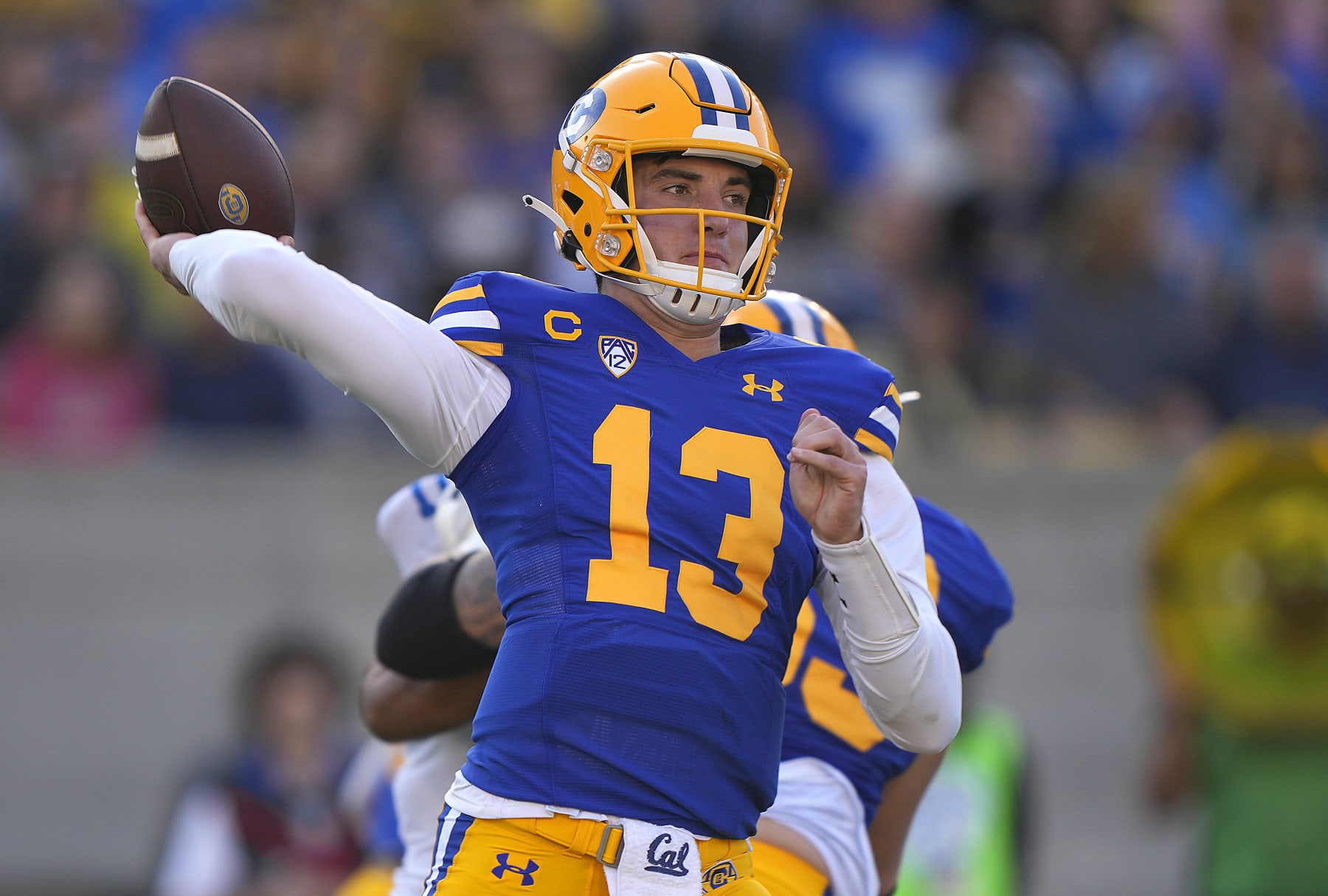 BERKELEY, CALIFORNIA - NOVEMBER 25: Jack Plummer #13 of the California Golden Bears throws a pass against the UCLA Bruins during the second quarter of an NCAA football game at California Memorial Stadium on November 25, 2022 in Berkeley, California. (Photo by Thearon W. Henderson/Getty Images)