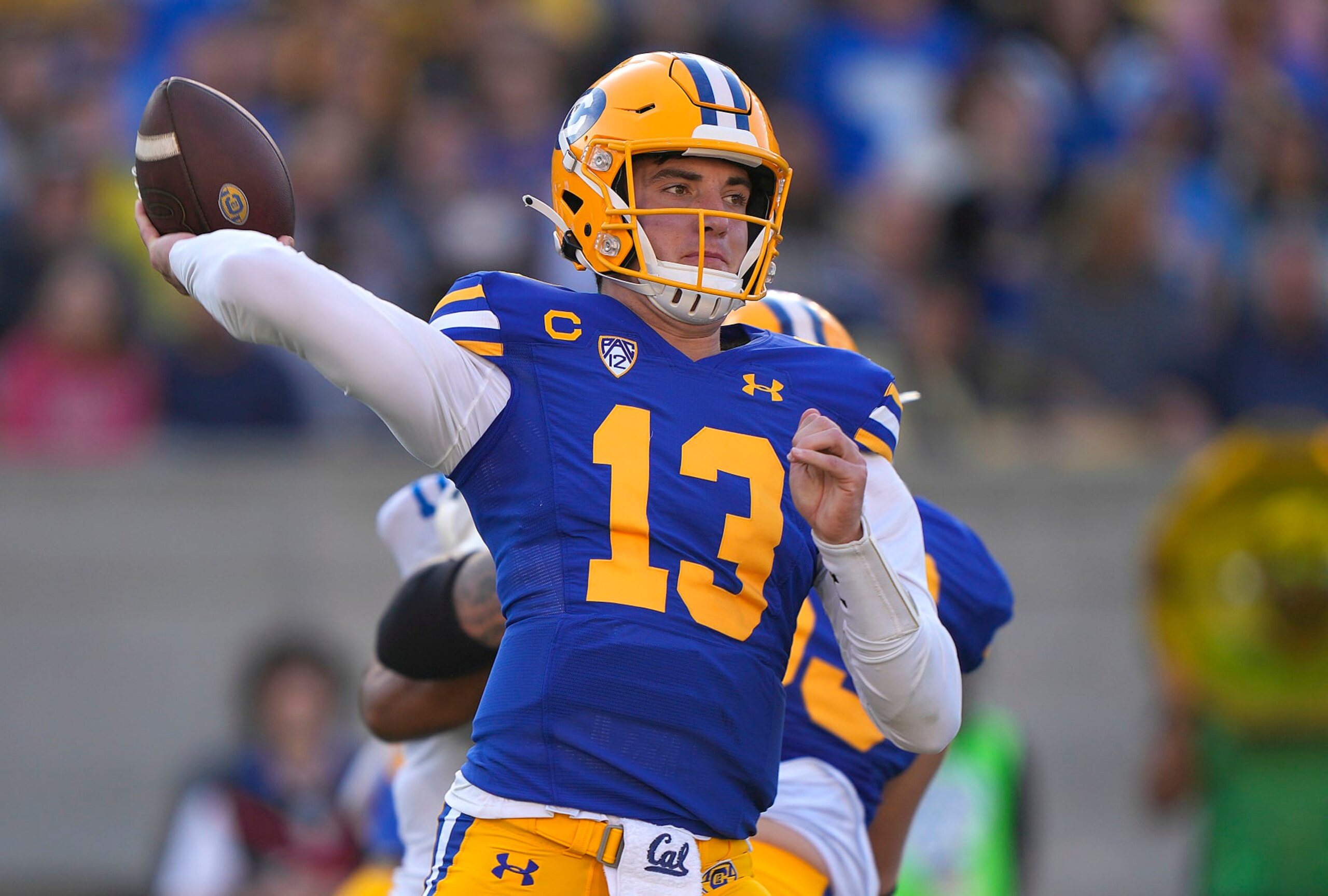 BERKELEY, CALIFORNIA - NOVEMBER 25: Jack Plummer #13 of the California Golden Bears throws a pass against the UCLA Bruins during the second quarter of an NCAA football game at California Memorial Stadium on November 25, 2022 in Berkeley, California. (Photo by Thearon W. Henderson/Getty Images)