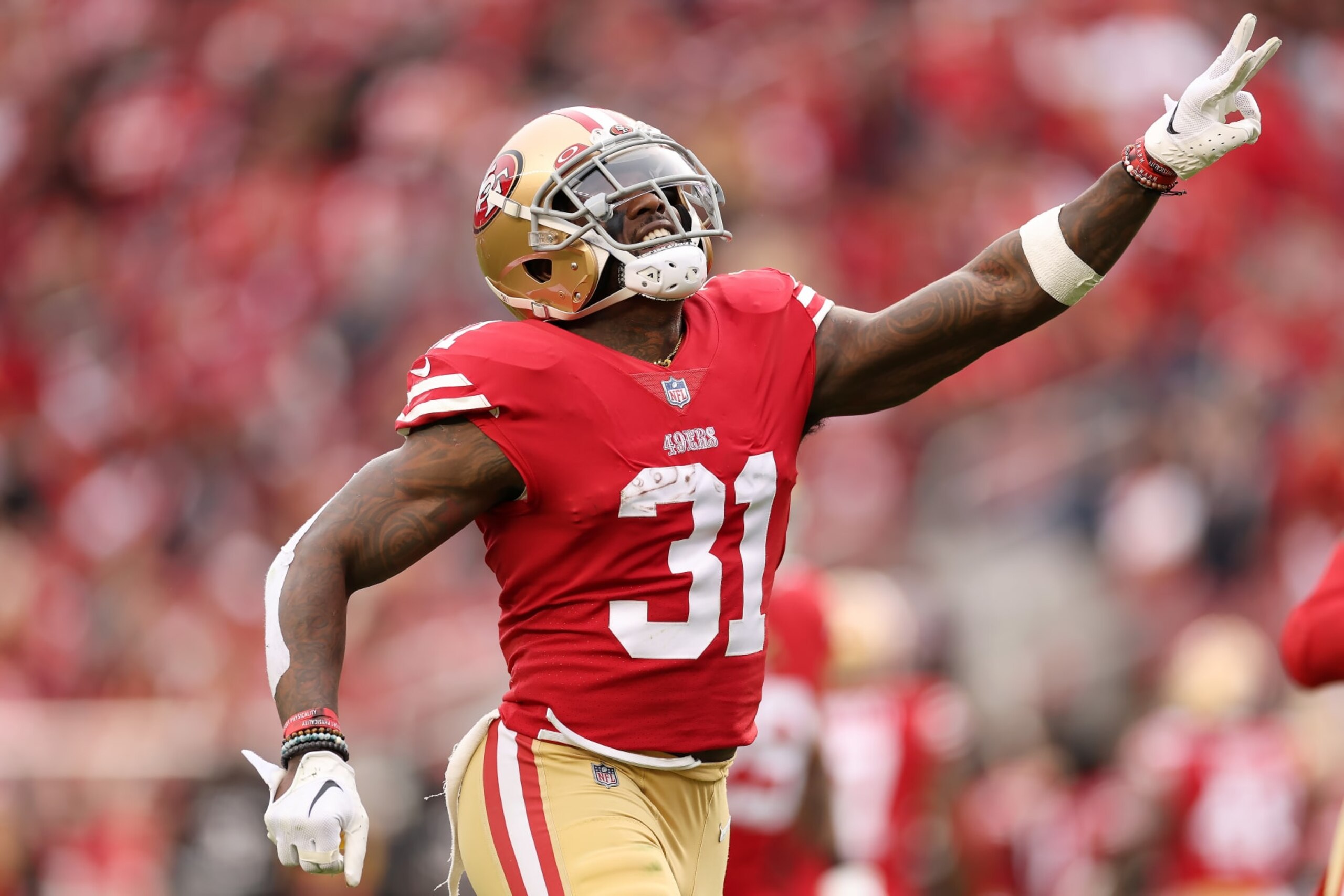 SANTA CLARA, CALIFORNIA - JANUARY 08: Tashaun Gipson Sr. #31 of the San Francisco 49ers celebrates an interception during the third quarter of the game against the Arizona Cardinals at Levi's Stadium on January 08, 2023 in Santa Clara, California. (Photo by Ezra Shaw/Getty Images) SANTA CLARA, CALIFORNIA - JANUARY 08: Tashaun Gipson Sr. #31 of the San Francisco 49ers celebrates an interception during the third quarter of the game against the Arizona Cardinals at Levi's Stadium on January 08, 2023 in Santa Clara, California. (Photo by Ezra Shaw/Getty Images)