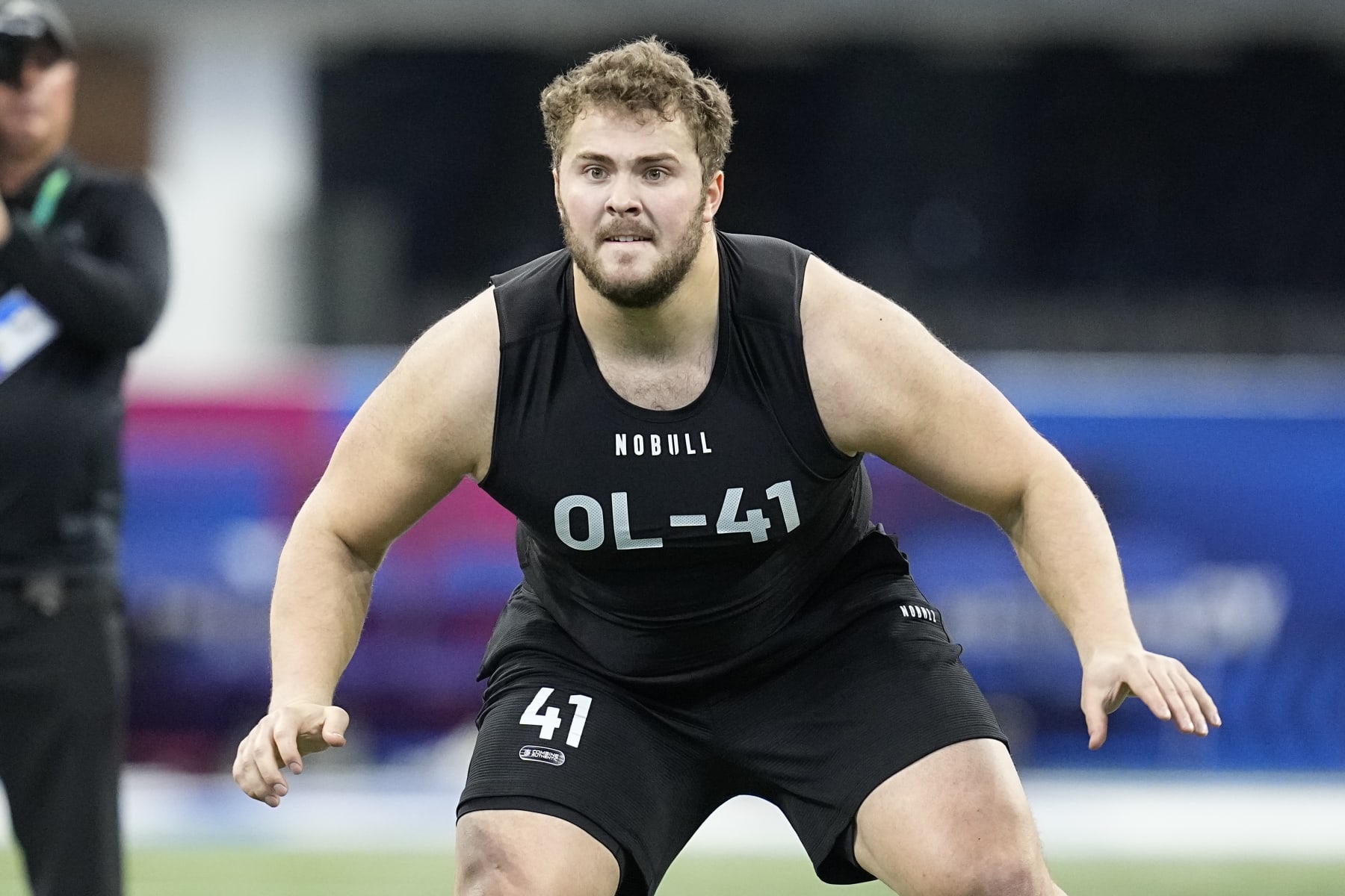Northwestern offensive lineman Peter Skoronski runs a drill at the NFL football scouting combine in Indianapolis, Sunday, March 5, 2023. (AP Photo/Darron Cummings)