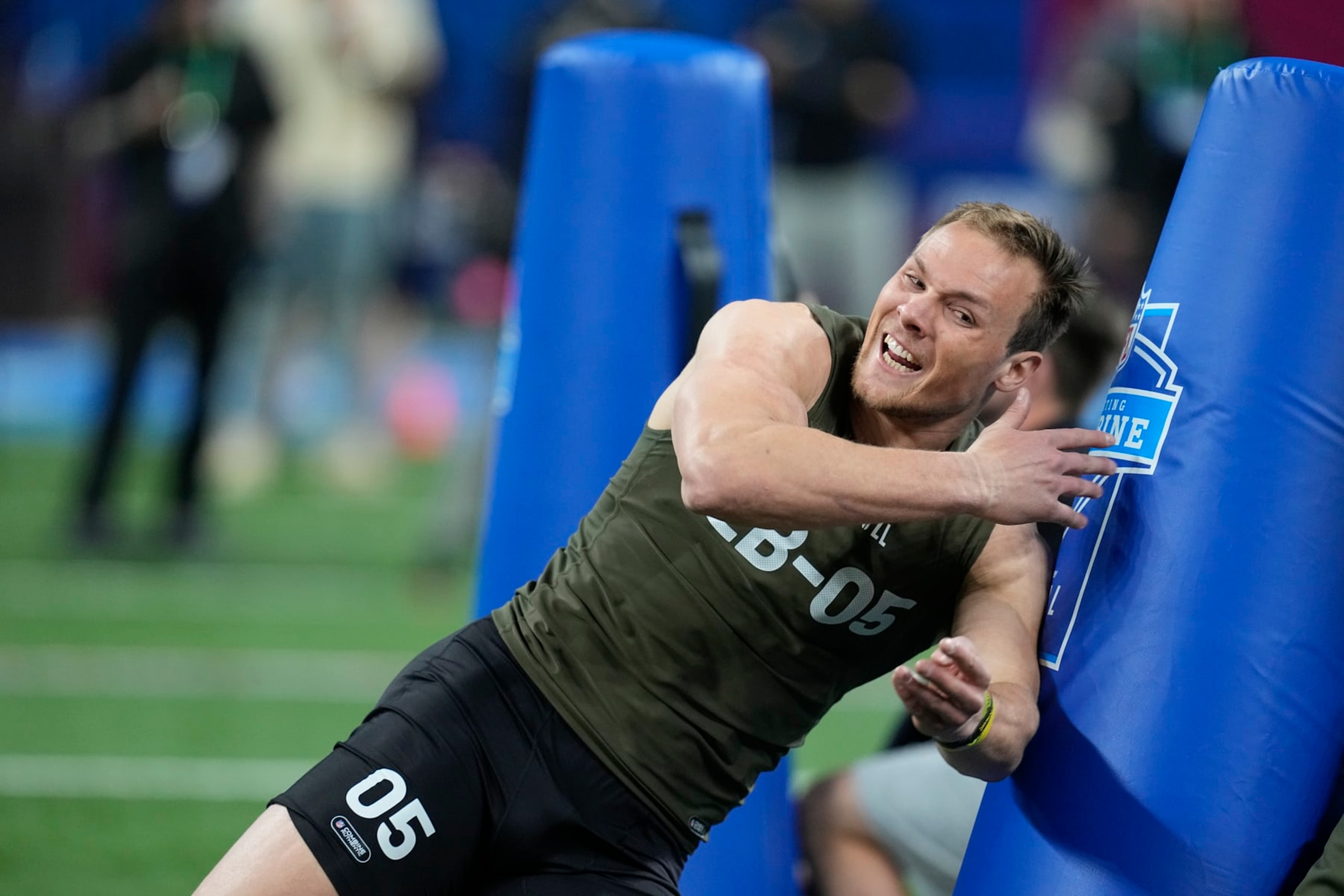 Iowa linebacker Jack Campbell runs a drill at the NFL football scouting combine in Indianapolis, Thursday, March 2, 2023. (AP Photo/Darron Cummings)
