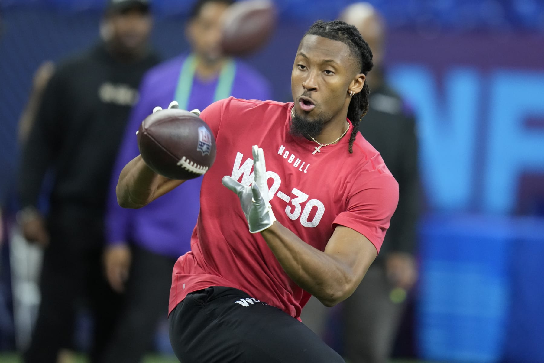 TCU wide receiver Quentin Johnston runs a drill at the NFL football scouting combine in Indianapolis, Saturday, March 4, 2023. (AP Photo/Michael Conroy)