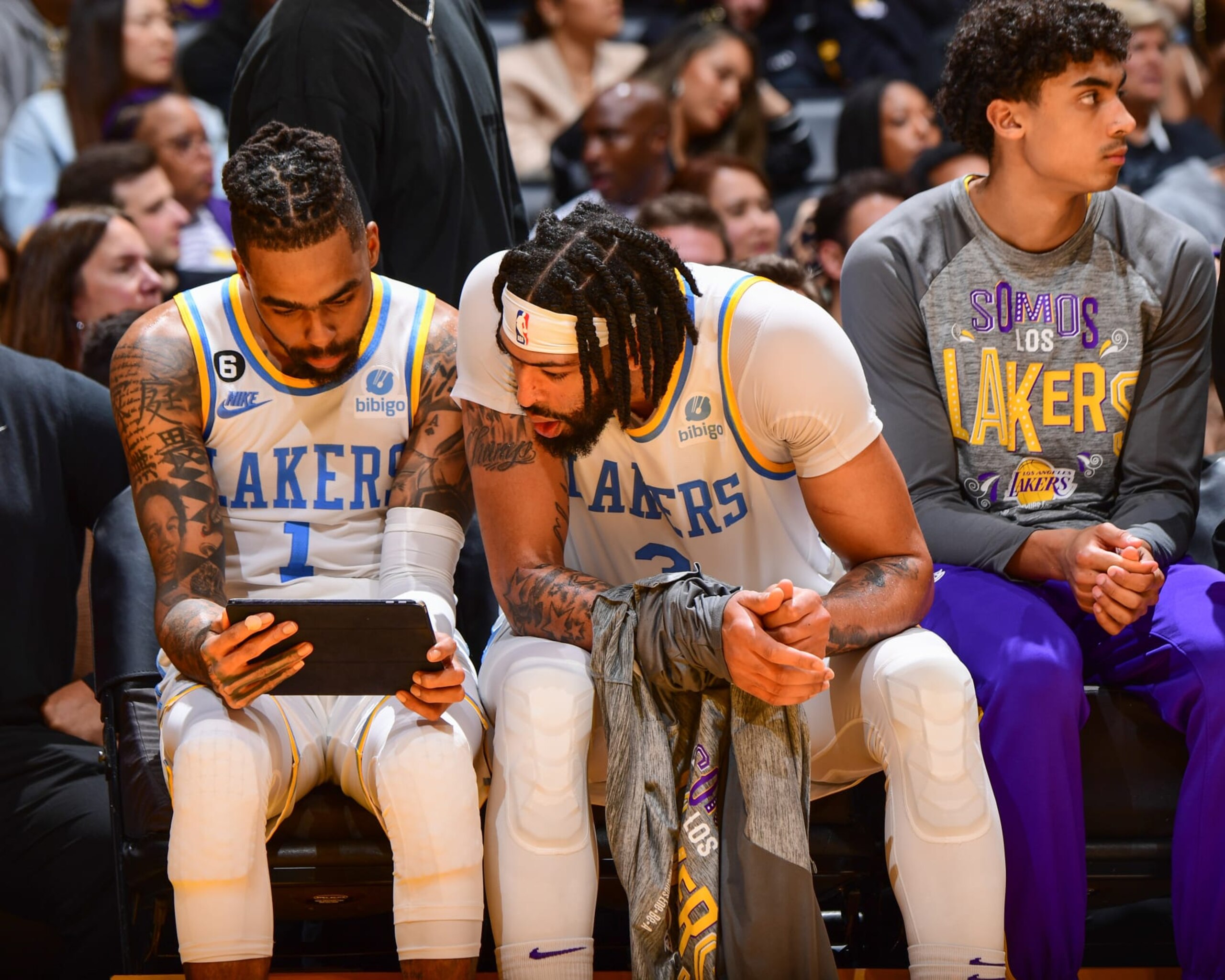 LOS ANGELES, CA - MARCH 12:  D'Angelo Russell #1 and Anthony Davis #3 of the Los Angeles Lakers looks on during the game on March 12, 2023 at Crypto.Com Arena in Los Angeles, California. NOTE TO USER: User expressly acknowledges and agrees that, by downloading and/or using this Photograph, user is consenting to the terms and conditions of the Getty Images License Agreement. Mandatory Copyright Notice: Copyright 2023 NBAE (Photo by Adam Pantozzi/NBAE via Getty Images)