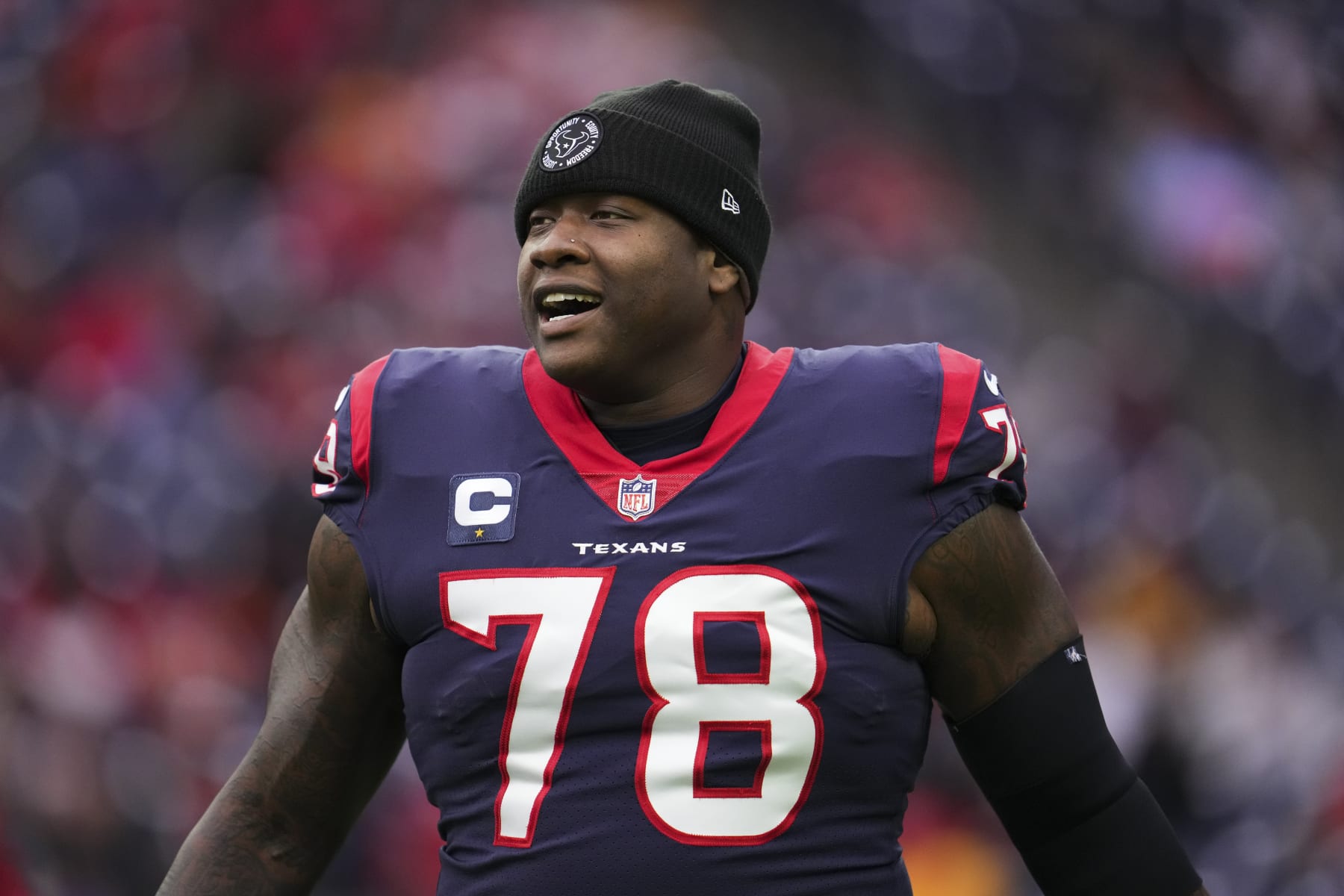 HOUSTON, TX - DECEMBER 18: Laremy Tunsil #78 of the Houston Texans runs onto the field during introductions against the Kansas City Chiefs at NRG Stadium on December 18, 2022 in Houston, Texas. (Photo by Cooper Neill/Getty Images)