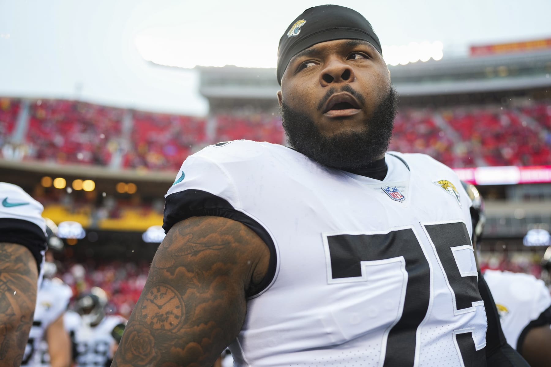 KANSAS CITY, MO - JANUARY 21: Jawaan Taylor #75 of the Jacksonville Jaguars leads the pregame huddle against the Kansas City Chiefs at GEHA Field at Arrowhead Stadium on January 21, 2023 in Kansas City, Missouri. (Photo by Cooper Neill/Getty Images)