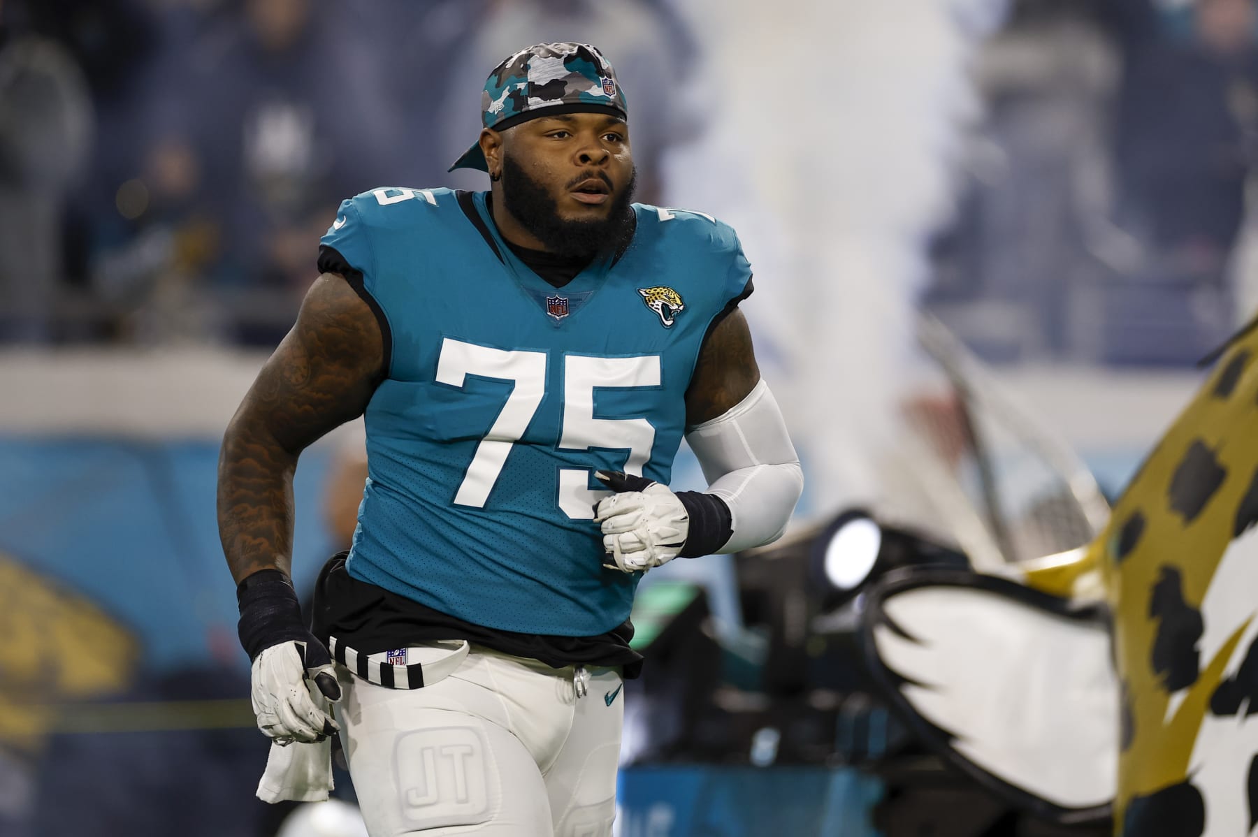 JACKSONVILLE, FL - JANUARY 14: Jacksonville Jaguars offensive tackle Jawaan Taylor (75) during the game between the Los Angeles Chargers and the Jacksonville Jaguars on January 14, 2023 at TIAA Bank Field in Jacksonville, Fl. (Photo by David Rosenblum/Icon Sportswire via Getty Images)