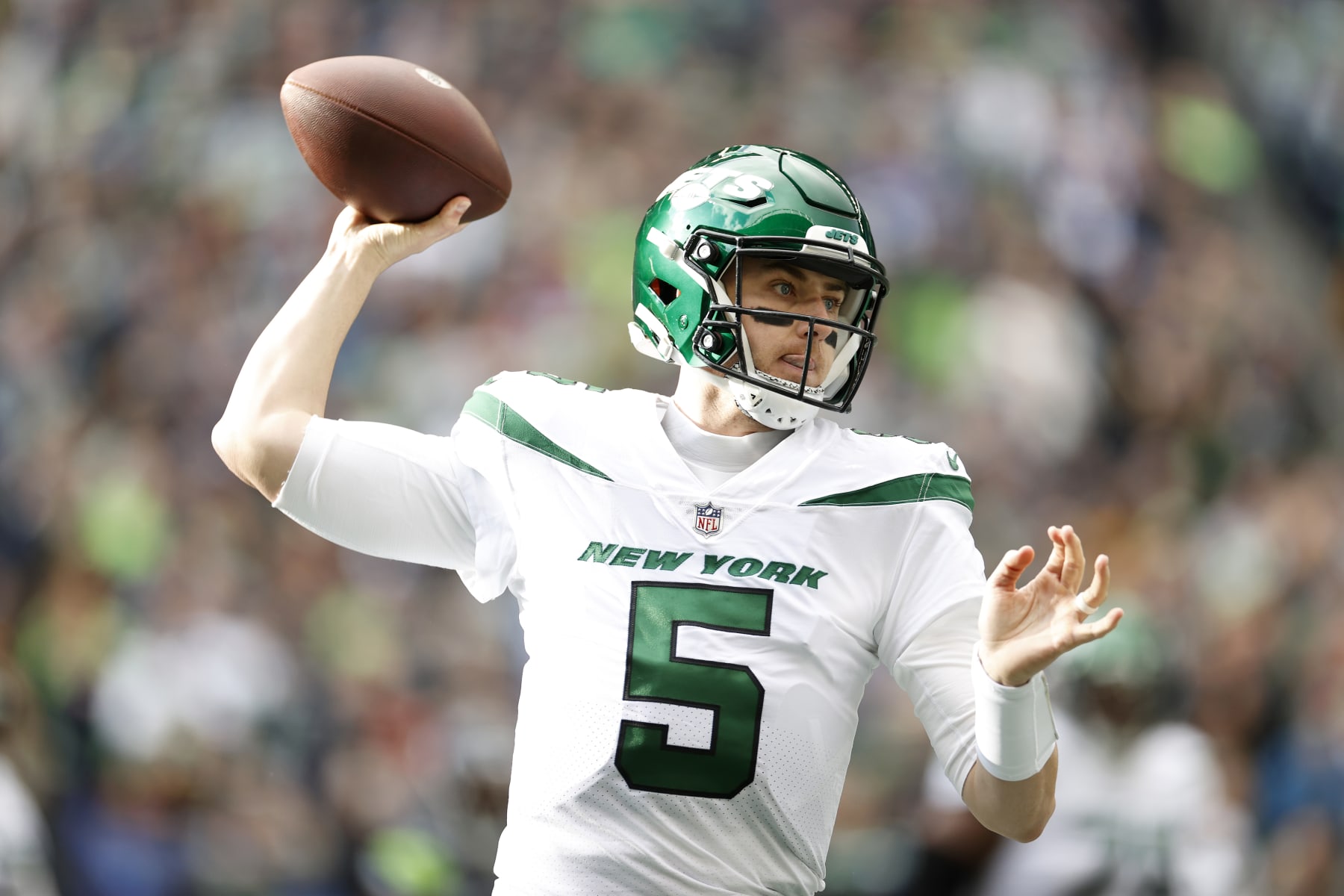 SEATTLE, WASHINGTON - JANUARY 01: Mike White #5 of the New York Jets throws a pass against the Seattle Seahawks during the first half of the game at Lumen Field on January 01, 2023 in Seattle, Washington. (Photo by Steph Chambers/Getty Images)