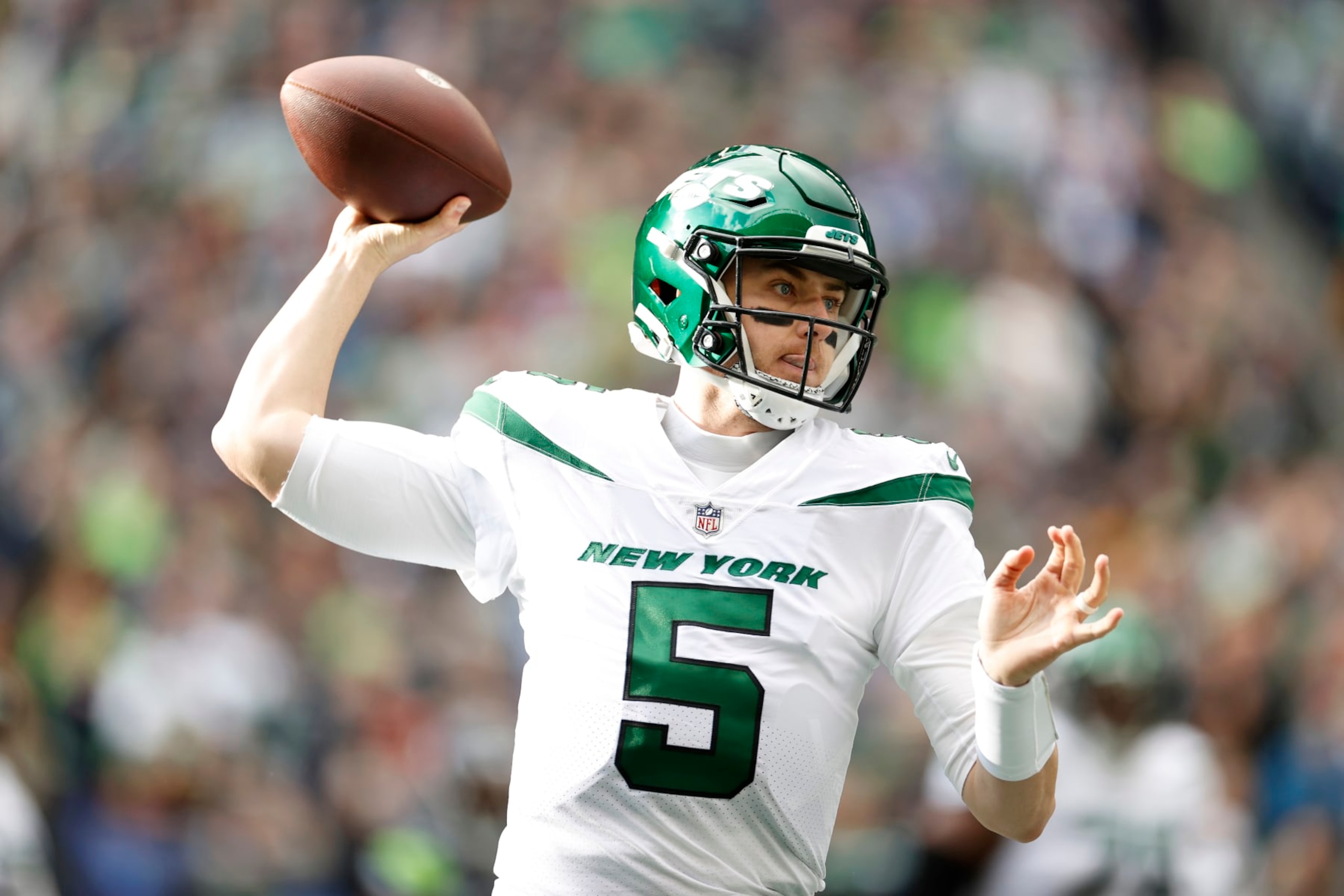 SEATTLE, WASHINGTON - JANUARY 01: Mike White #5 of the New York Jets throws a pass against the Seattle Seahawks during the first half of the game at Lumen Field on January 01, 2023 in Seattle, Washington. (Photo by Steph Chambers/Getty Images)