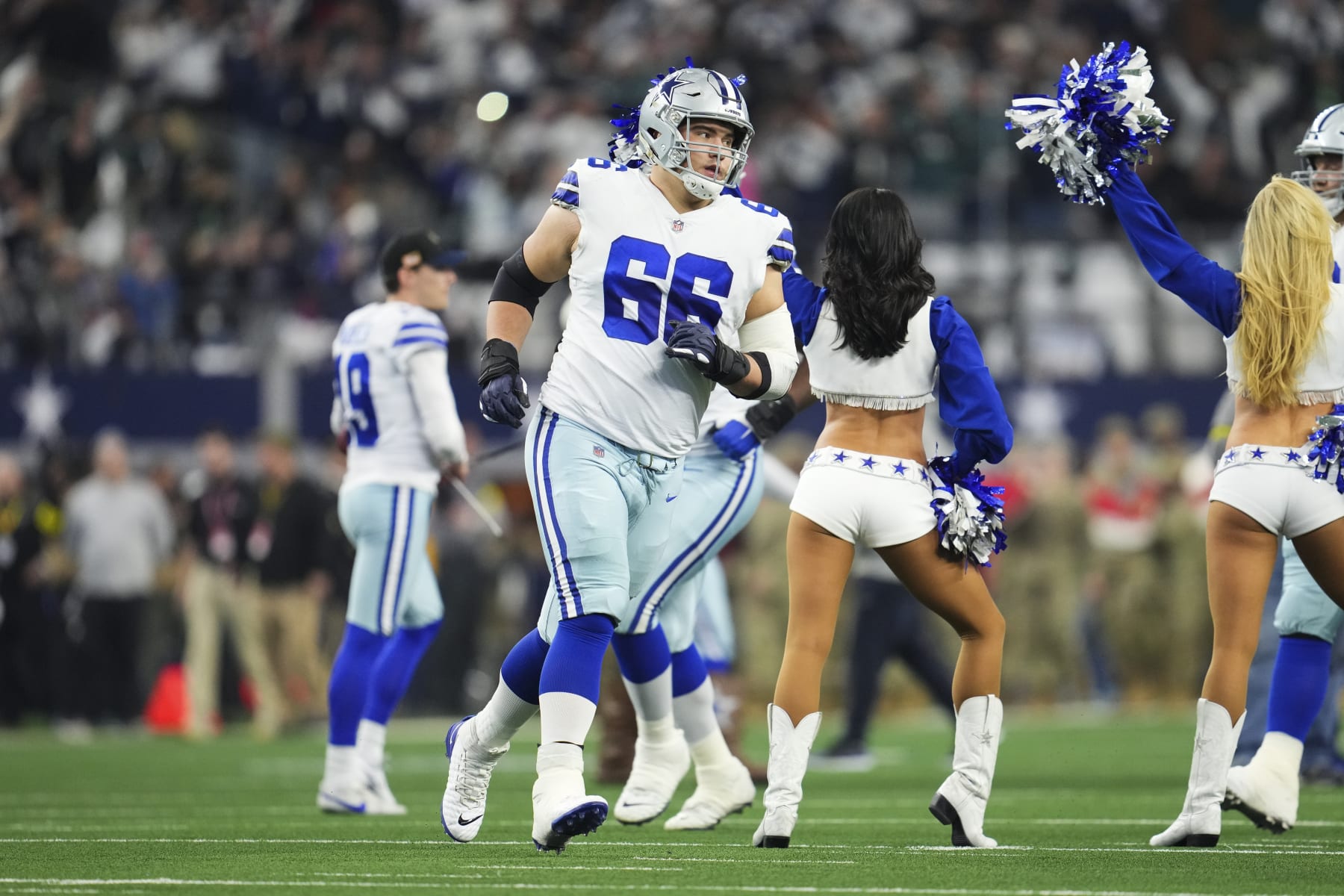 ARLINGTON, TX - DECEMBER 24: Connor McGovern #66 of the Dallas Cowboys runs onto the field during introductions against the Philadelphia Eagles at AT&T Stadium on December 24, 2022 in Arlington, Texas. (Photo by Cooper Neill/Getty Images)