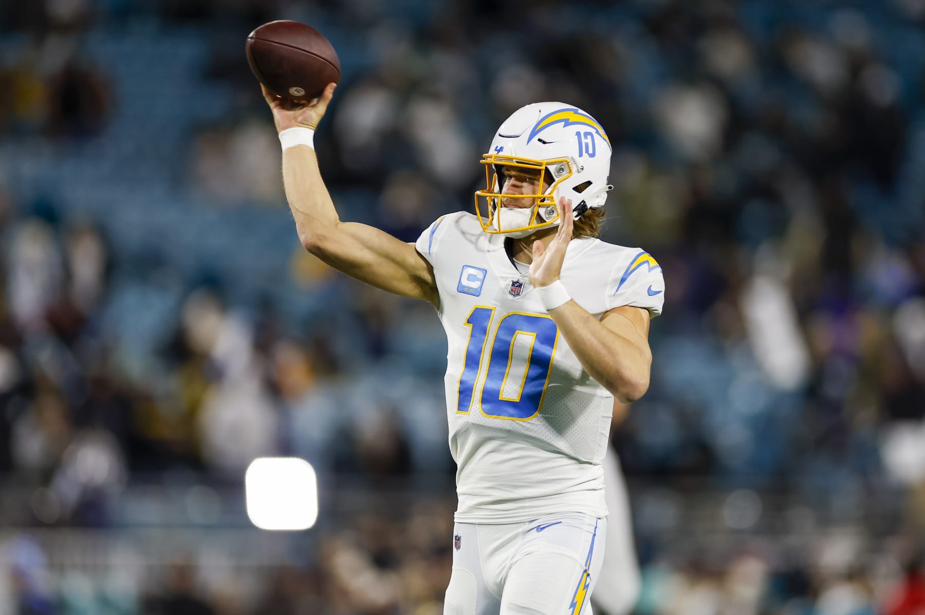 JACKSONVILLE, FL - JANUARY 14: Los Angeles Chargers quarterback Justin Herbert (10) throws a pass during the game between the Los Angeles Chargers and the Jacksonville Jaguars on January 14, 2023 at TIAA Bank Field in Jacksonville, Fl. (Photo by David Rosenblum/Icon Sportswire via Getty Images)