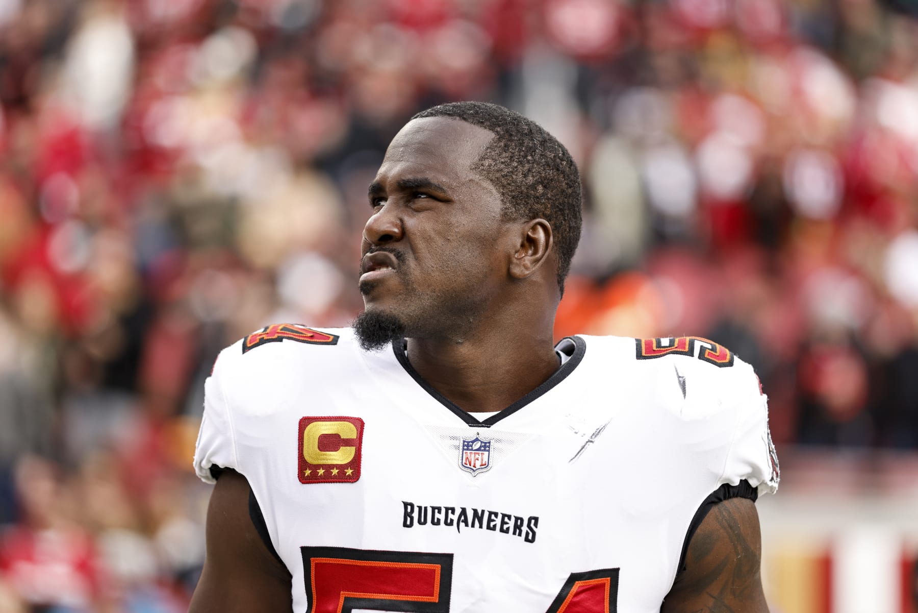 SANTA CLARA, CALIFORNIA - DECEMBER 11: Lavonte David #54 of the Tampa Bay Buccaneers looks on during the national anthem prior to an NFL football game between the San Francisco 49ers and the Tampa Bay Buccaneers at Levi's Stadium on December 11, 2022 in Santa Clara, California. (Photo by Michael Owens/Getty Images)