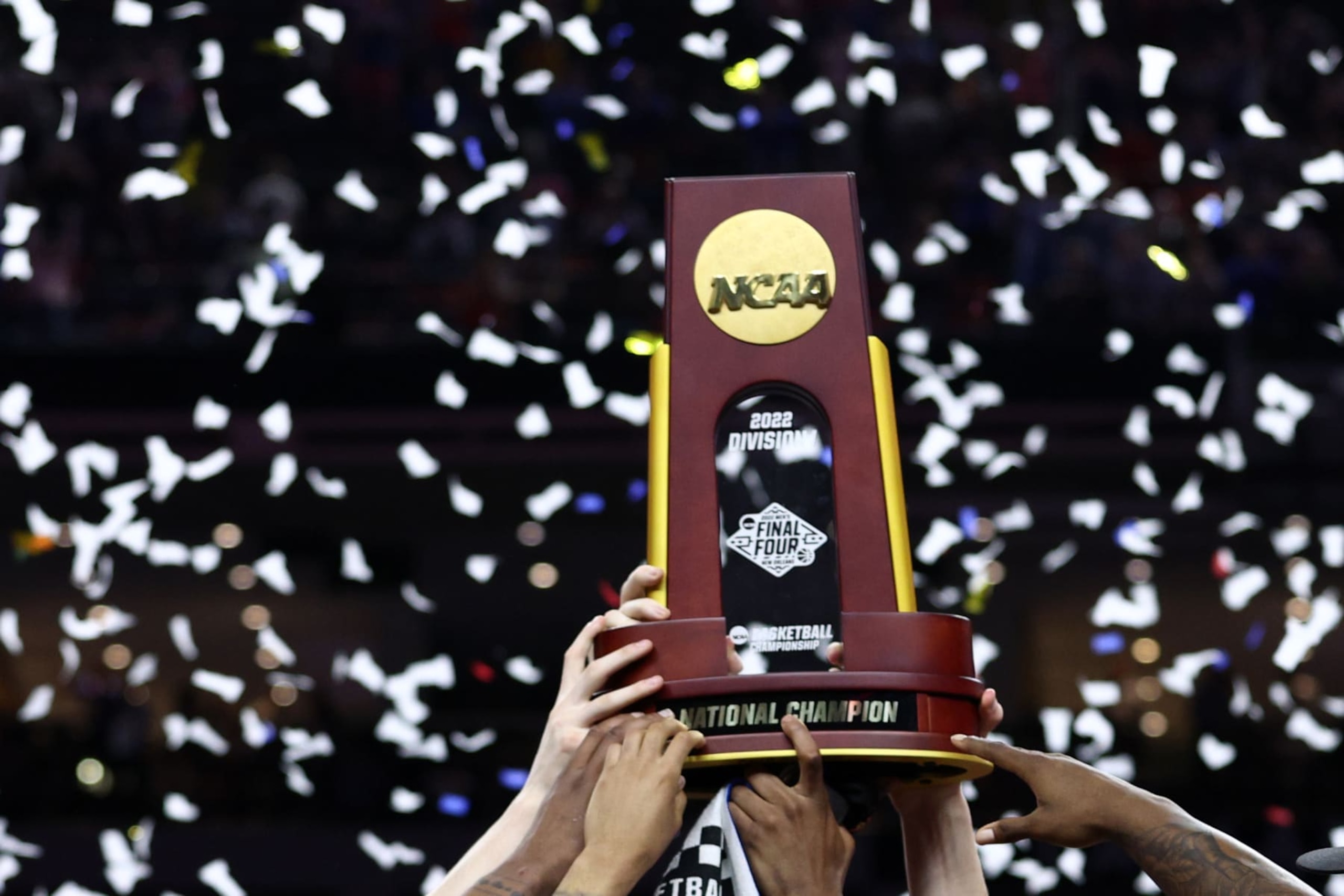 NEW ORLEANS, LOUISIANA - APRIL 04: The Kansas Jayhawks celebrate with the trophy after defeating the North Carolina Tar Heels 72-69 during the 2022 NCAA Men's Basketball Tournament National Championship at Caesars Superdome on April 04, 2022 in New Orleans, Louisiana. (Photo by Tom Pennington/Getty Images)