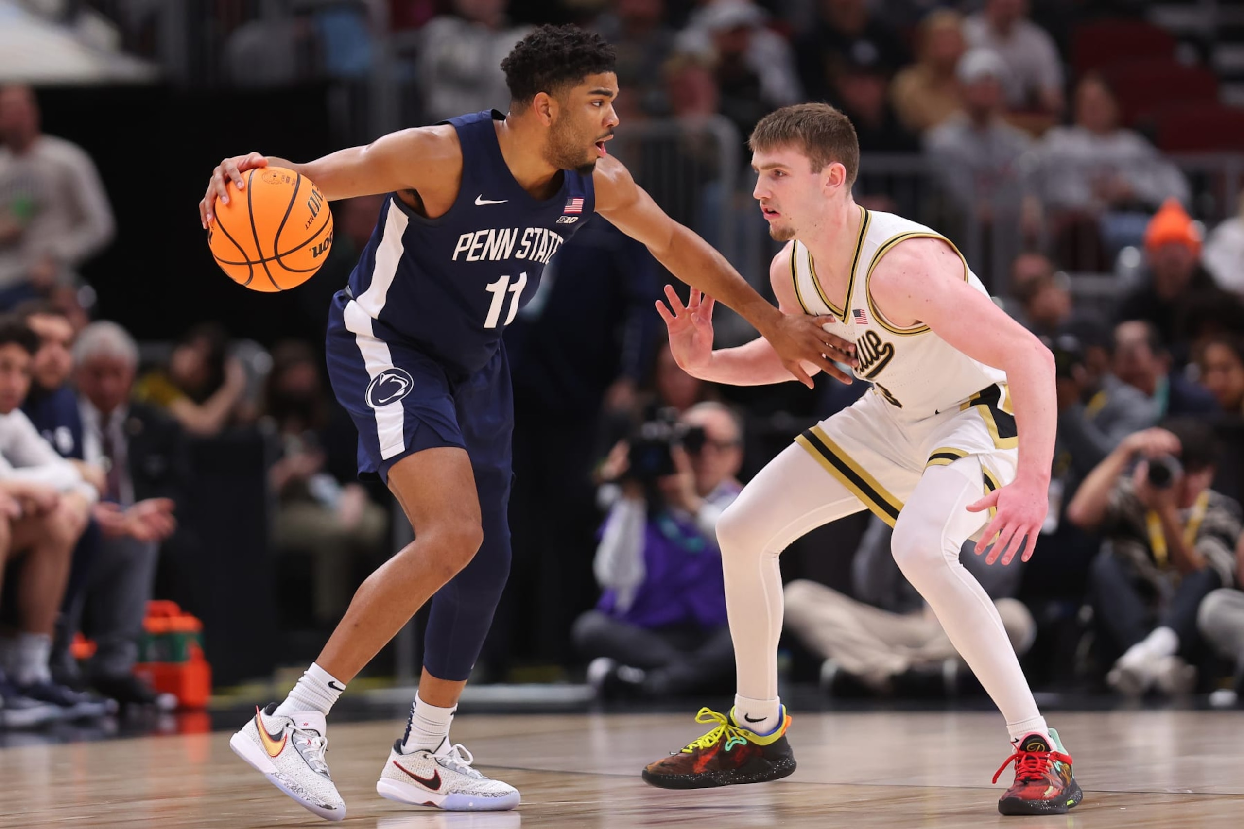 CHICAGO, ILLINOIS - MARCH 12: Camren Wynter #11 of the Penn State Nittany Lions is defended by Braden Smith #3 of the Purdue Boilermakers during the Big Ten Basketball Tournament Championship game at United Center on March 12, 2023 in Chicago, Illinois. (Photo by Michael Reaves/Getty Images)