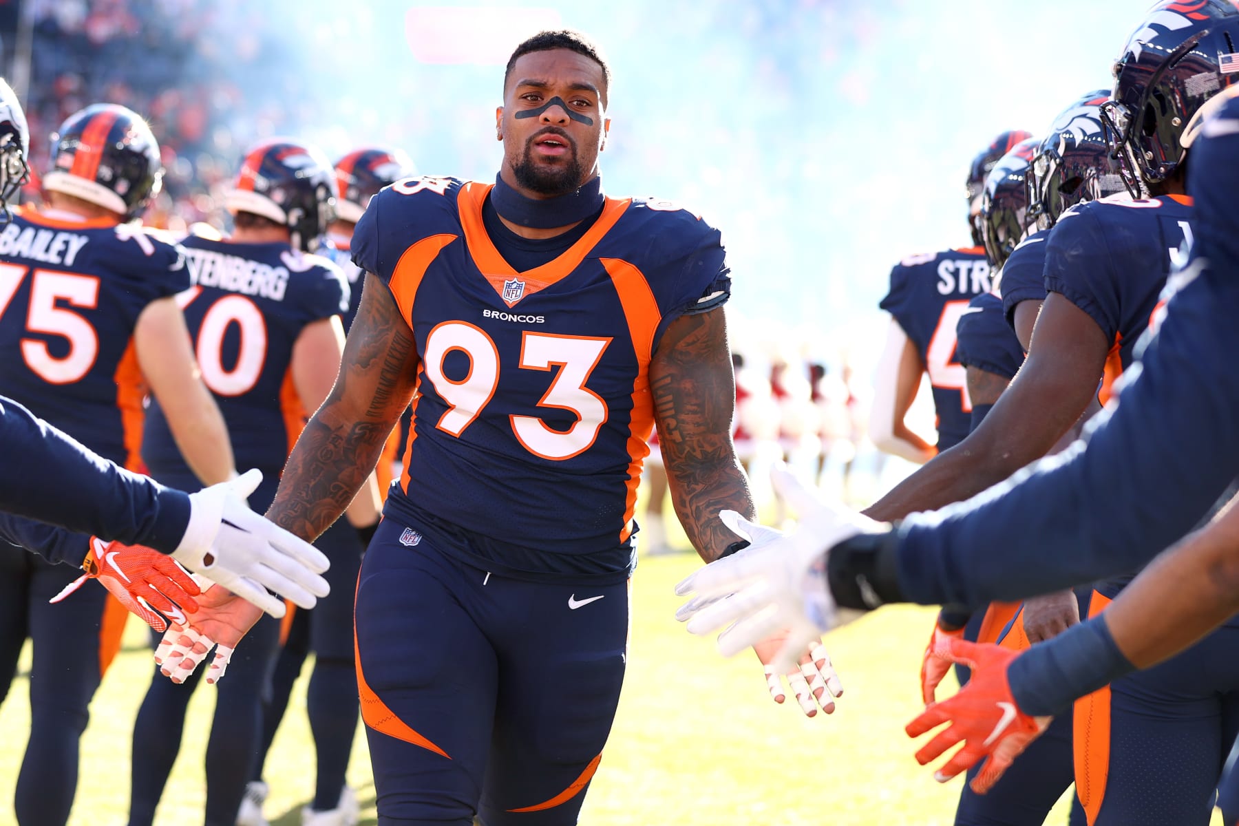 DENVER, COLORADO - DECEMBER 11: DreMont Jones #93 of the Denver Broncos takes the field against the Kansas City Chiefs at Empower Field At Mile High on December 11, 2022 in Denver, Colorado. (Photo by Jamie Schwaberow/Getty Images)