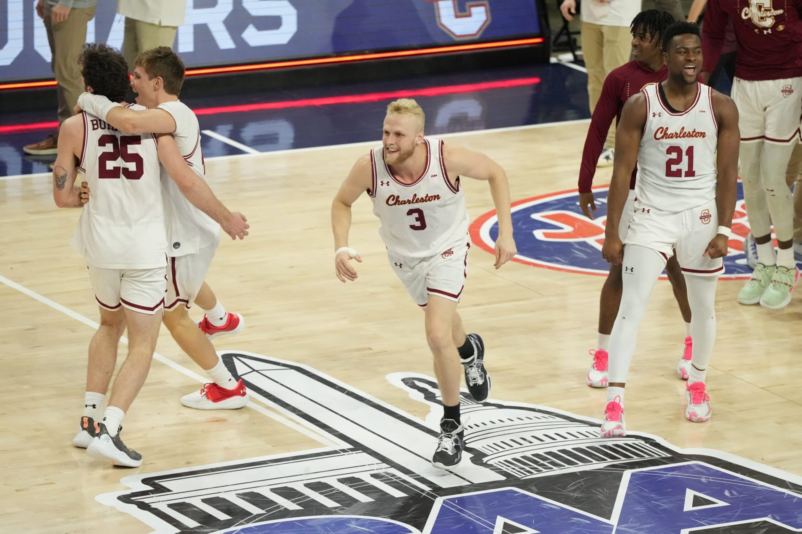 WASHINGTON, DC - MARCH 07:  Dalton Bolon #3 of the Charleston Cougars celebrates winning the CAA Men's Basketball Championship game against the North Carolina-Wilmington Seahawks at the Entertainment & Sports Arena on March 7, 2023 in Washington, DC.  (Photo by Mitchell Layton/Getty Images)