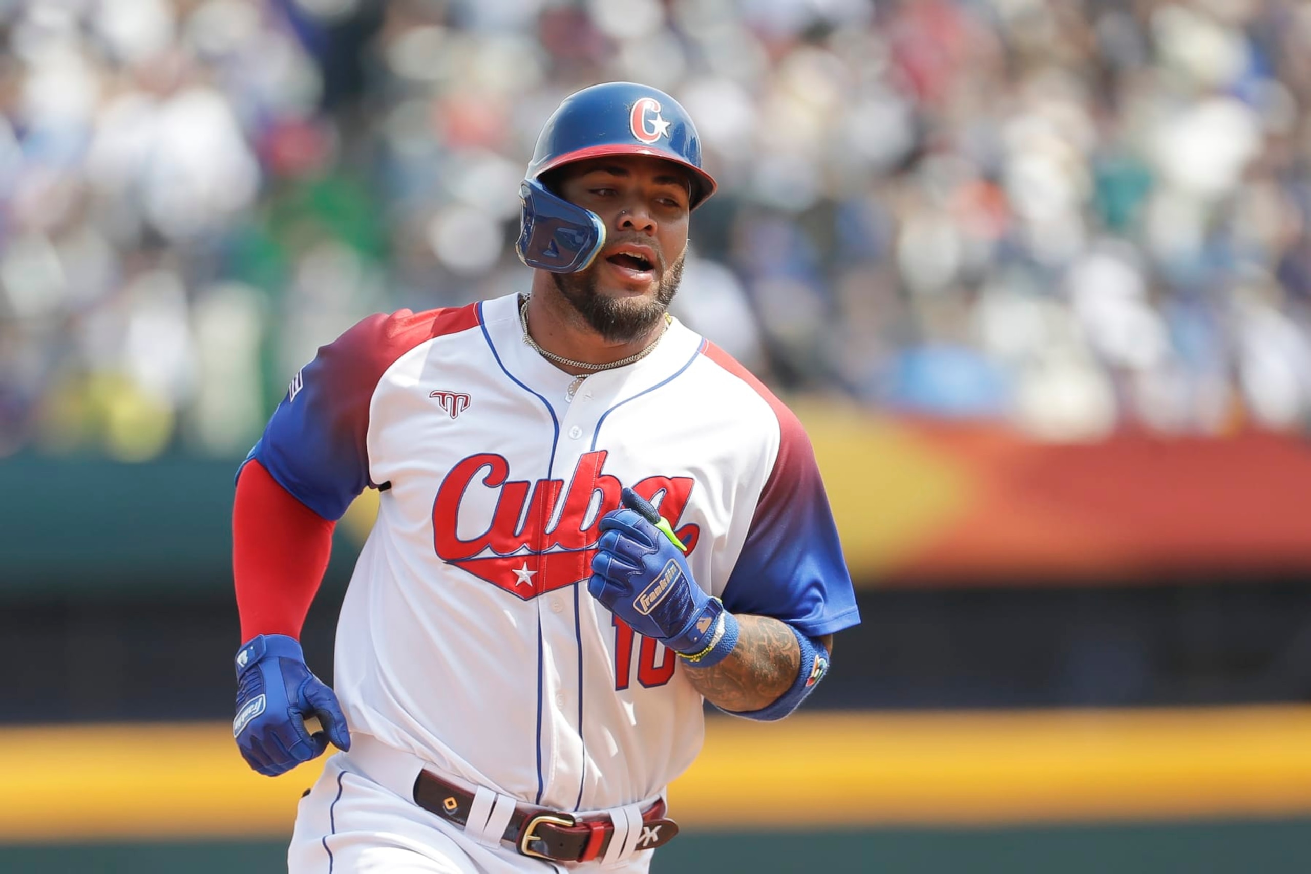 CORRECTS TO MONCADA'S HOME RUN IN THE SECOND INNING - Cuba's Yoan Moncada runs back to home base after his home run in the second inning of a Pool A game against Taiwan, during the World Baseball Classic (WBC) at Taichung Intercontinental Baseball Stadium in Taichung, Taiwan, Sunday, March 12, 2023. (AP Photo/I-Hwa Cheng)