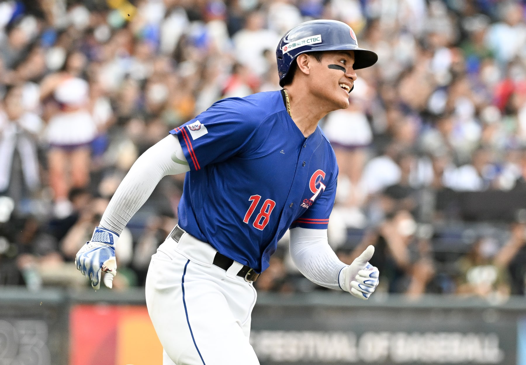 TAICHUNG, TAIWAN - MARCH 12: Yu Chang #18 of Chinese Taipei hits a RBI double at the bottom of the 9th inning during the World Baseball Classic Pool A game between Chinese Taipei and Cuba at Taichung Intercontinental Baseball Stadium on March 12, 2023 in Taichung, Taiwan. (Photo by Gene Wang/Getty Images)