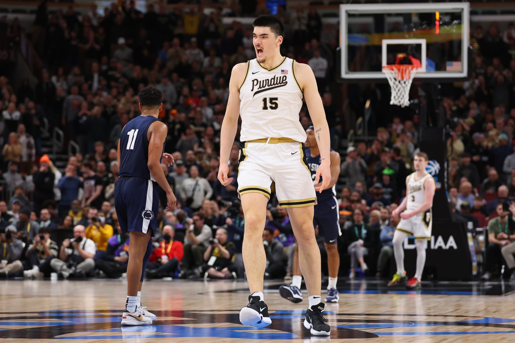 CHICAGO, ILLINOIS - MARCH 12: Zach Edey #15 of the Purdue Boilermakers celebrates against the Penn State Nittany Lions during the Big Ten Basketball Tournament Championship game at United Center on March 12, 2023 in Chicago, Illinois. (Photo by Michael Reaves/Getty Images)