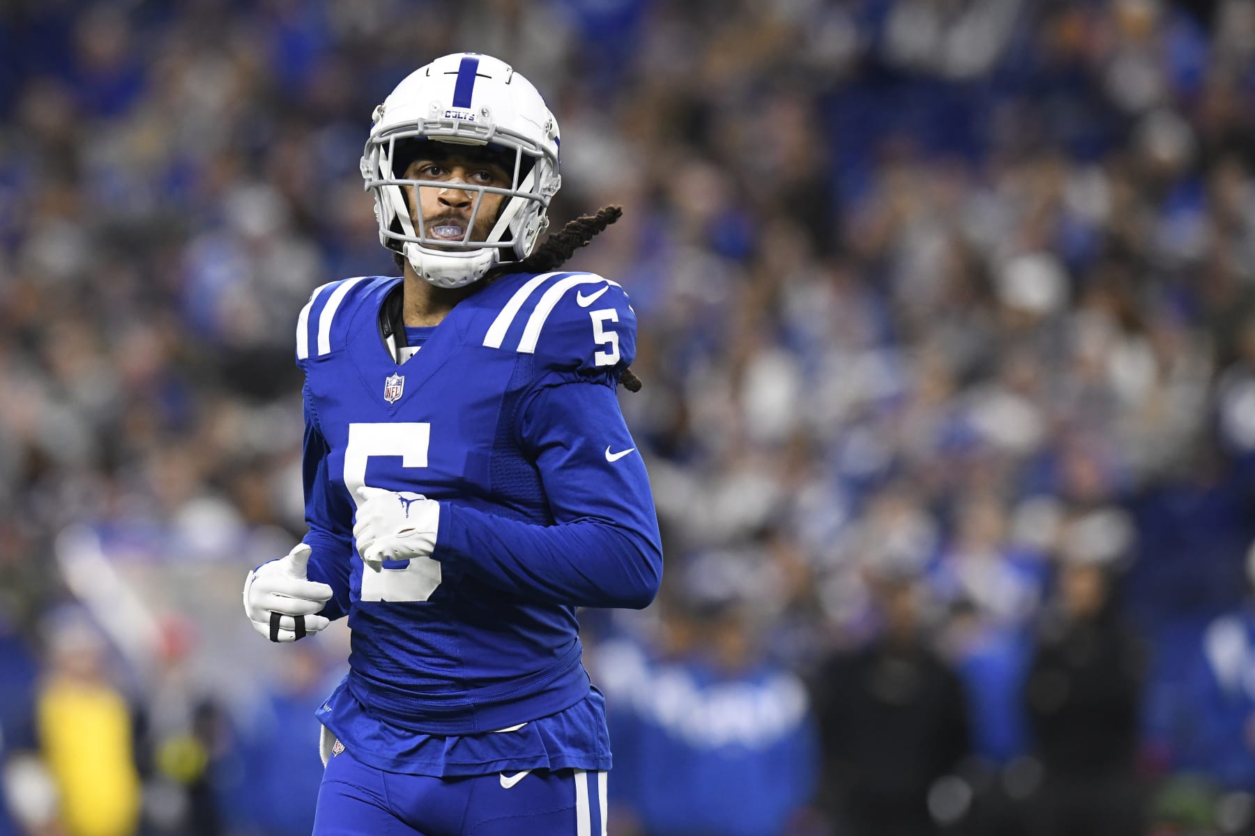 INDIANAPOLIS, IN - DECEMBER 26: Indianapolis Colts cornerback Stephon Gilmore (5) jogs across the field during the NFL football game between the Los Angeles Chargers and the Indianapolis Colts on December 26, 2022, at Lucas Oil Stadium in Indianapolis, Indiana. (Photo by Michael Allio/Icon Sportswire via Getty Images)