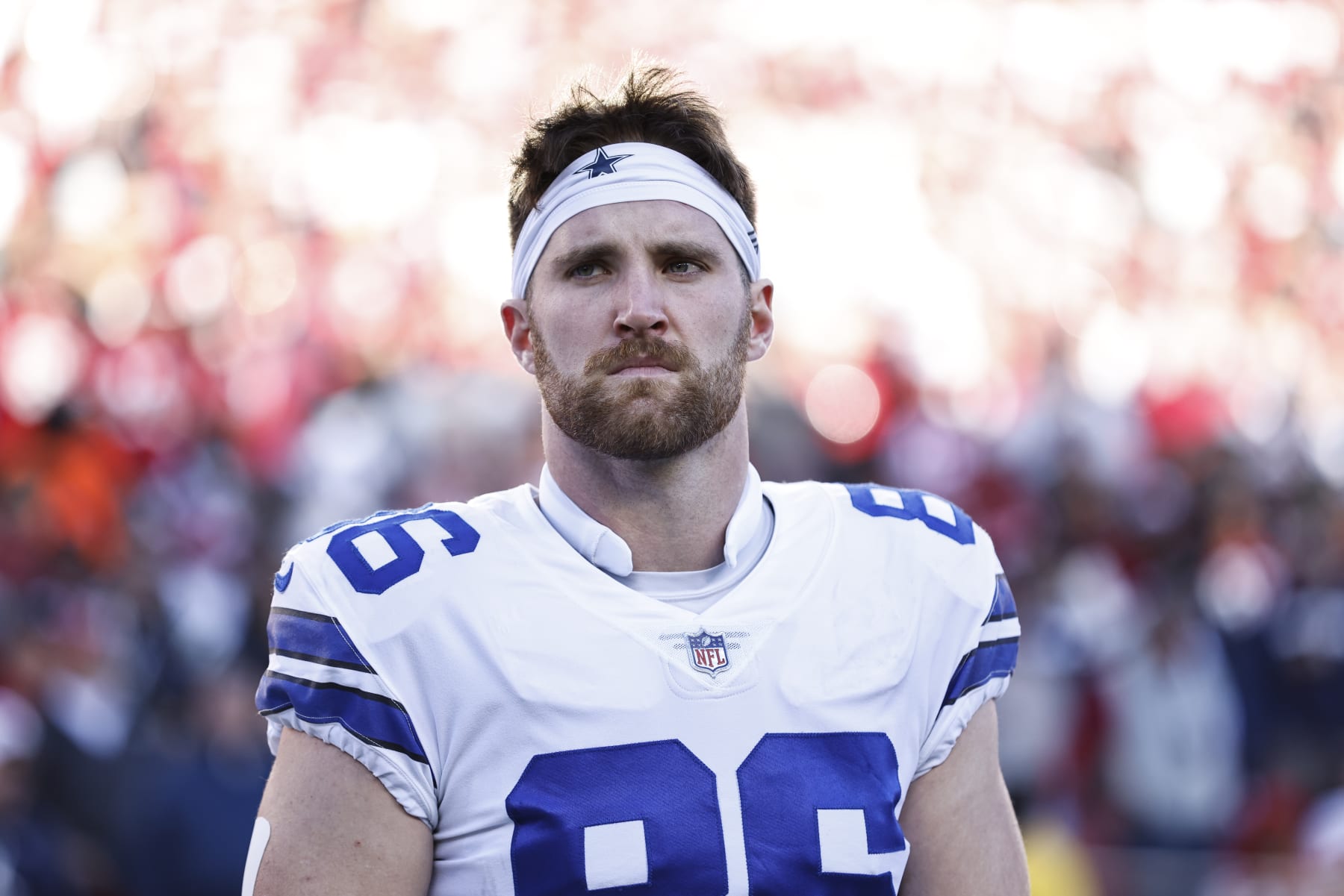 SANTA CLARA, CALIFORNIA - JANUARY 22: Dalton Schultz #86 of the Dallas Cowboys looks on during the national anthem prior to an NFL divisional round playoff football game between the San Francisco 49ers and the Dallas Cowboys at Levi's Stadium on January 22, 2023 in Santa Clara, California. (Photo by Michael Owens/Getty Images)